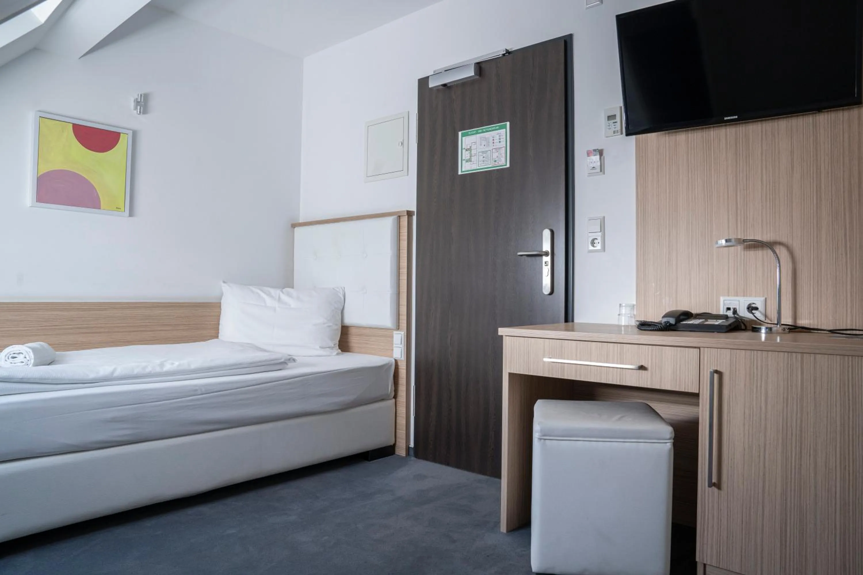 Bed in Alpha & Omega Hotel Stuttgart