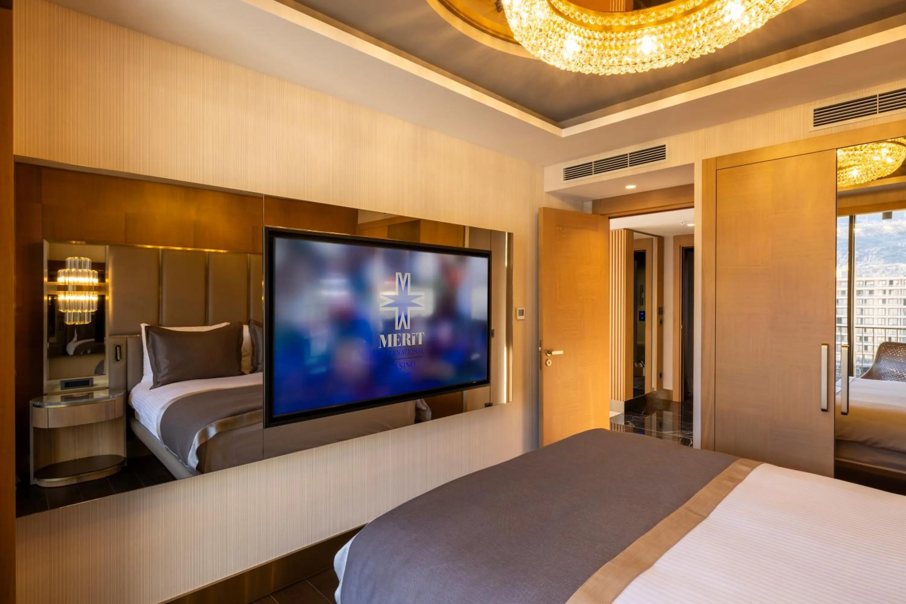 Bed in Merit Starlit Hotel & Residences