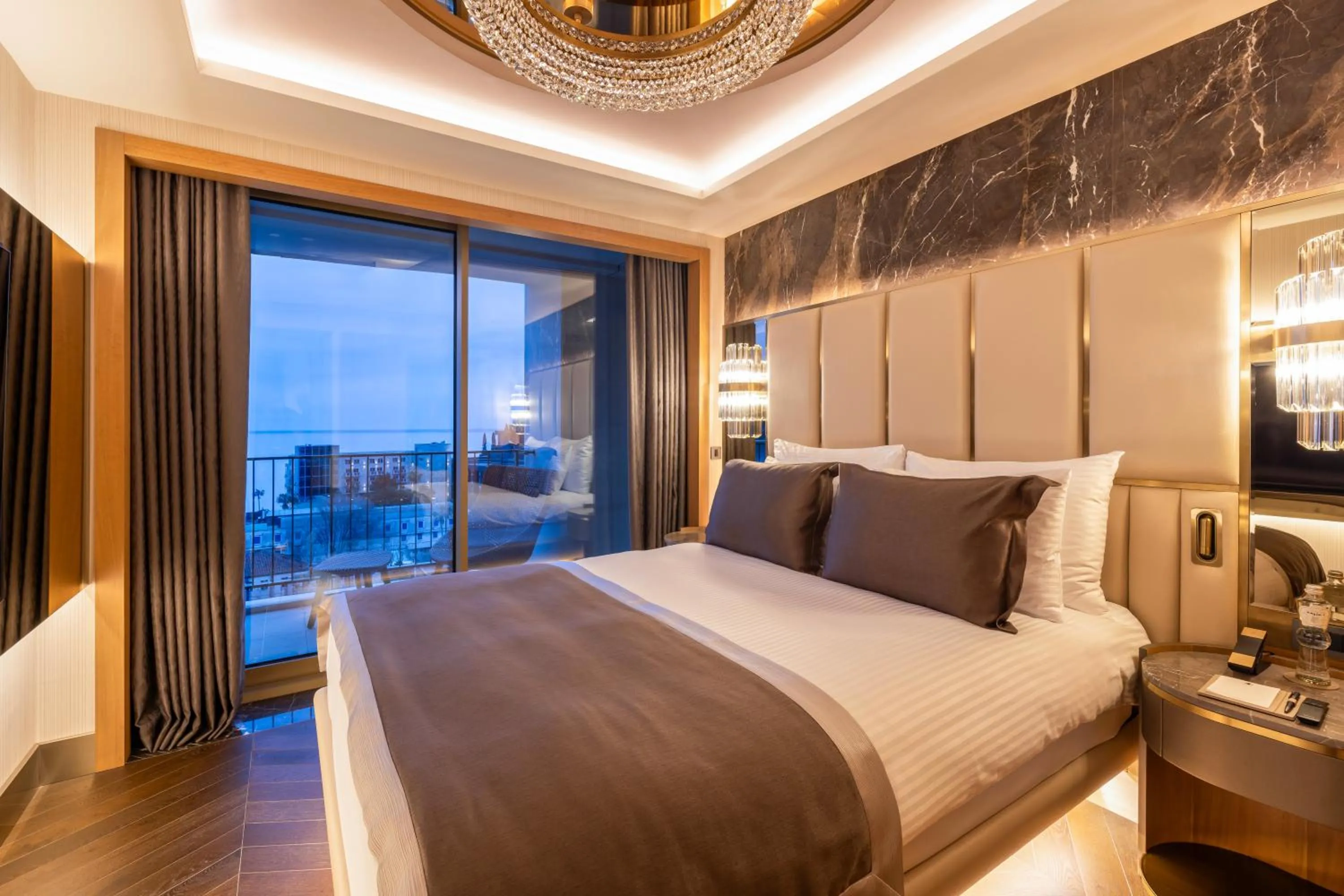 Bed in Merit Starlit Hotel & Residences