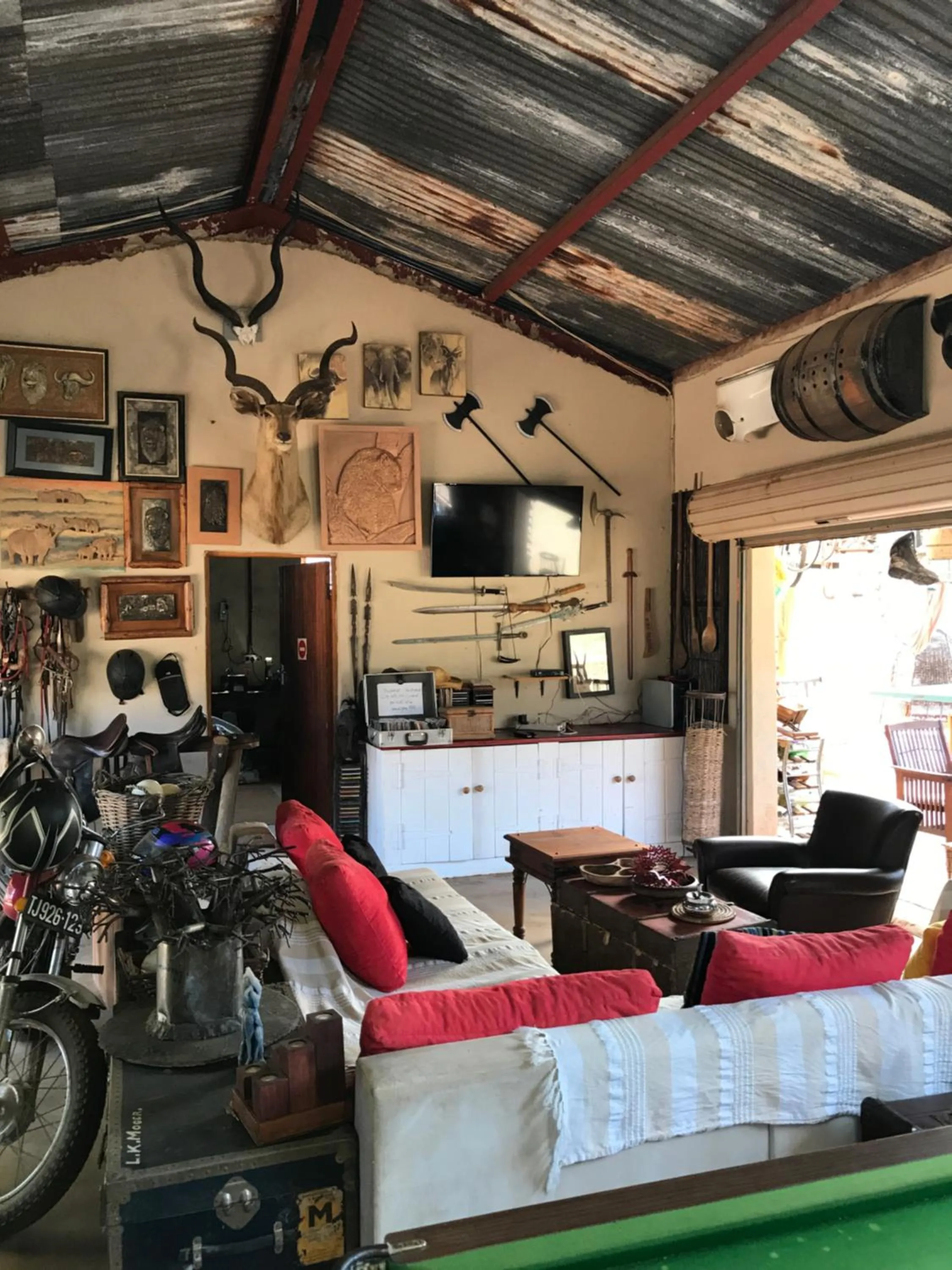 Communal lounge/ TV room in Caracal Lodge