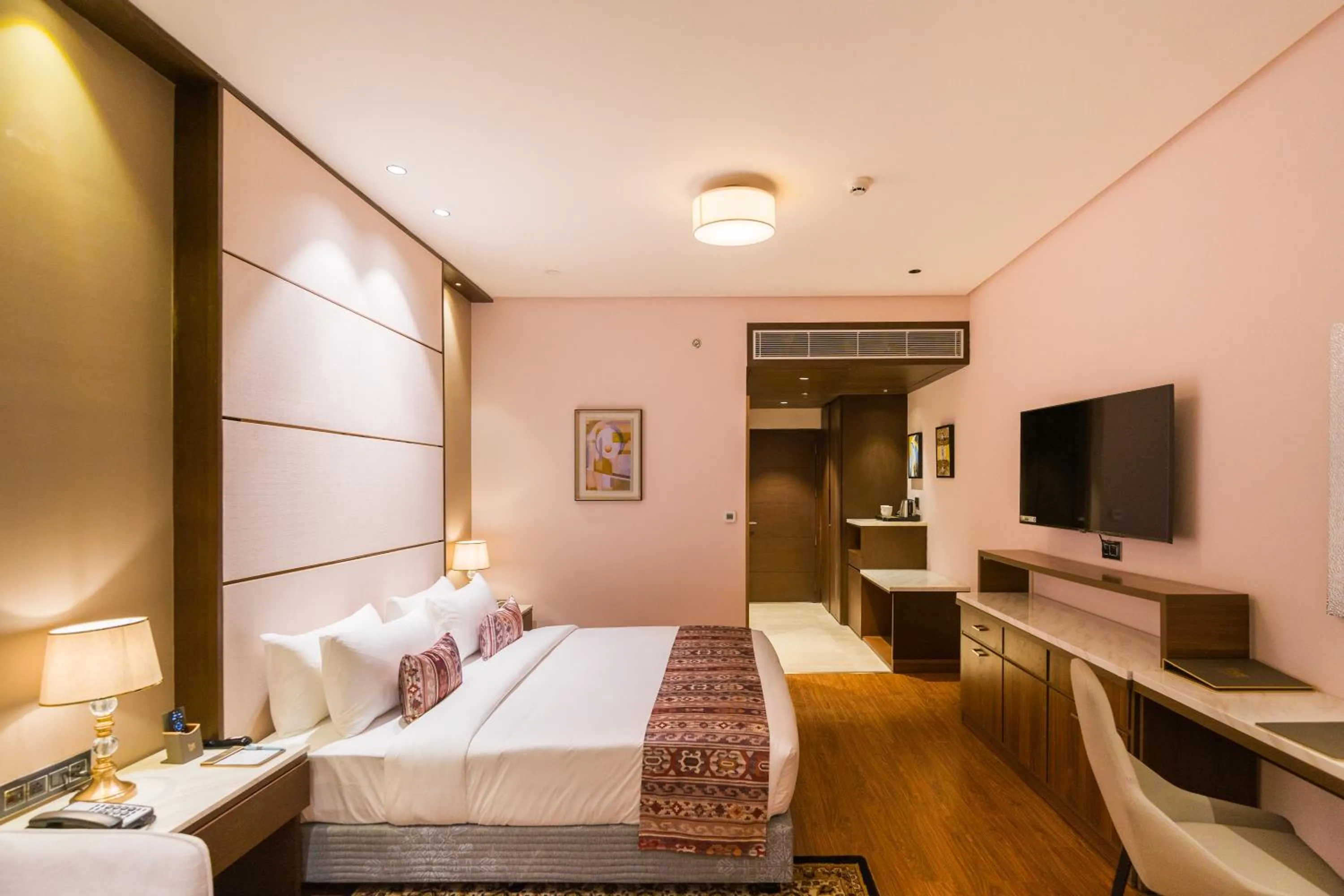 Bed in The Maple Hotel