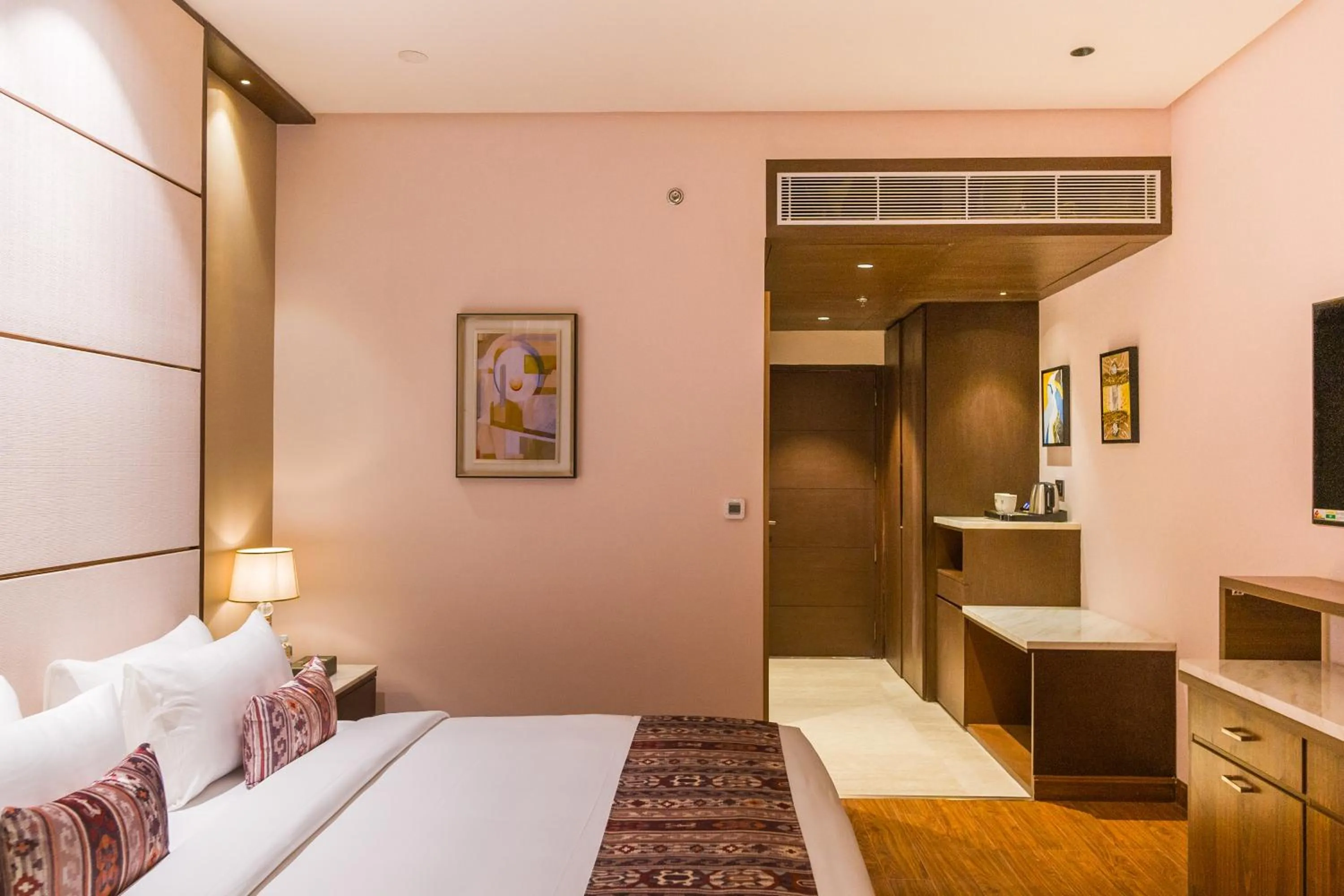 Bed in The Maple Hotel