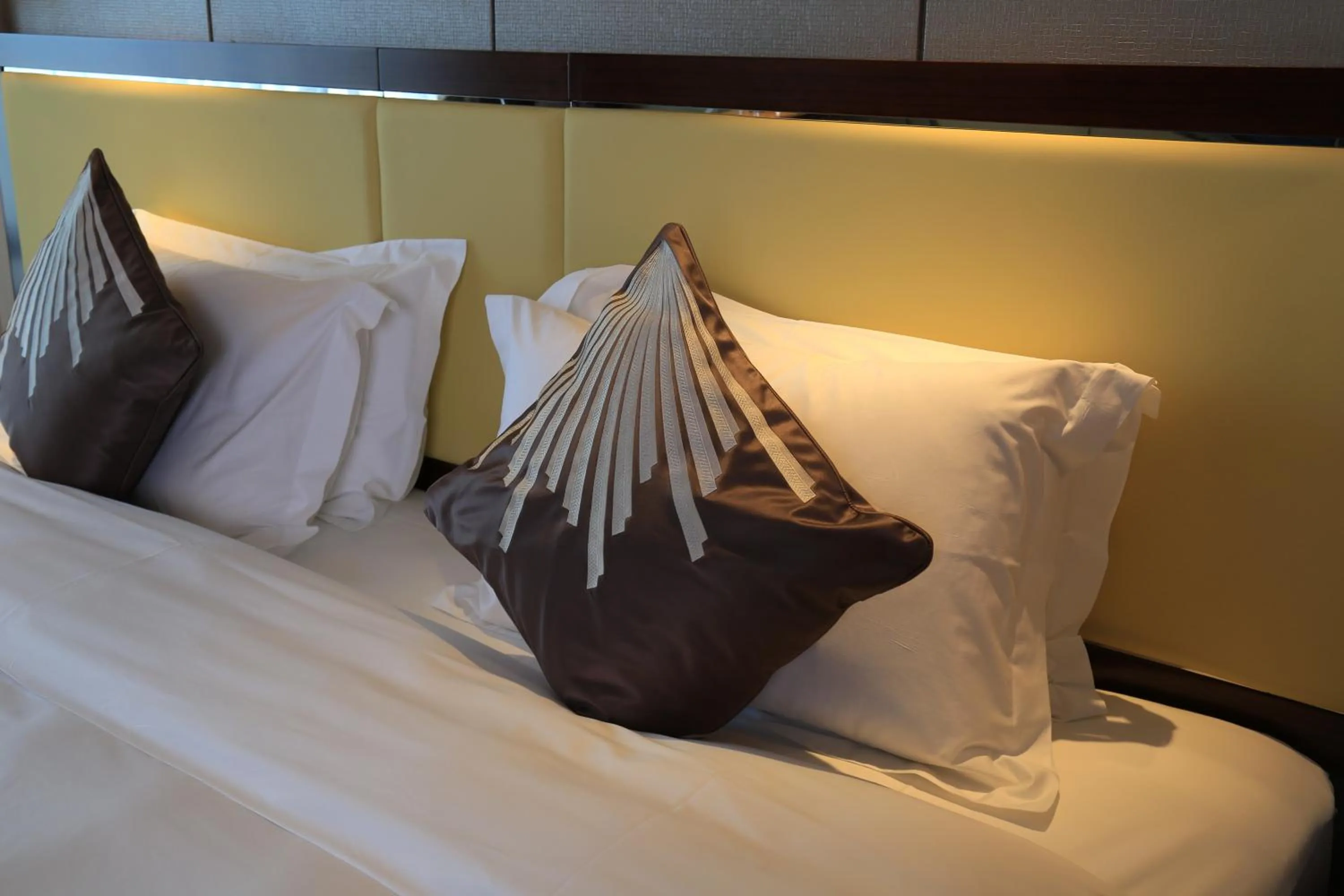 Bed in Guangzhou ChangFeng Gloria Plaza Hotel