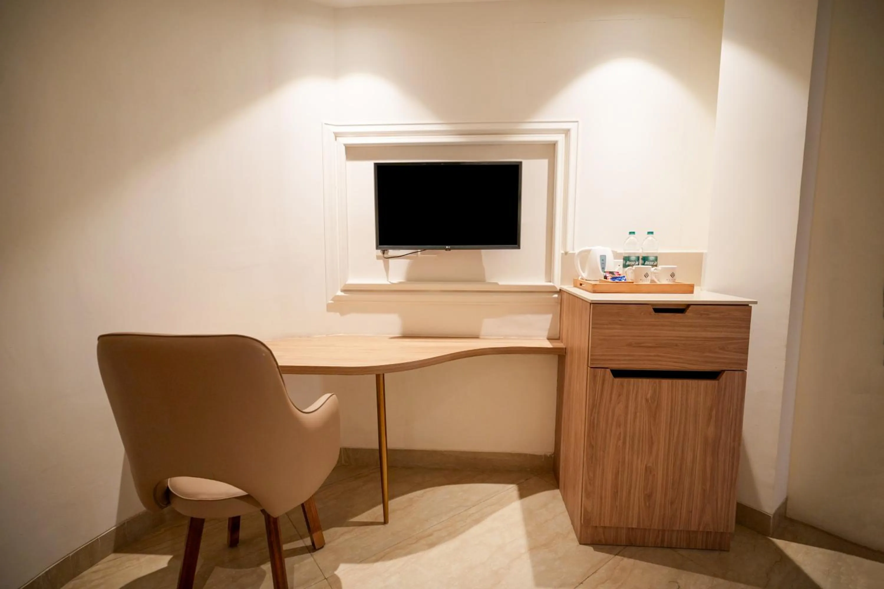 TV and multimedia in Alivaa Hotel Gurugram Sohna Road City Center