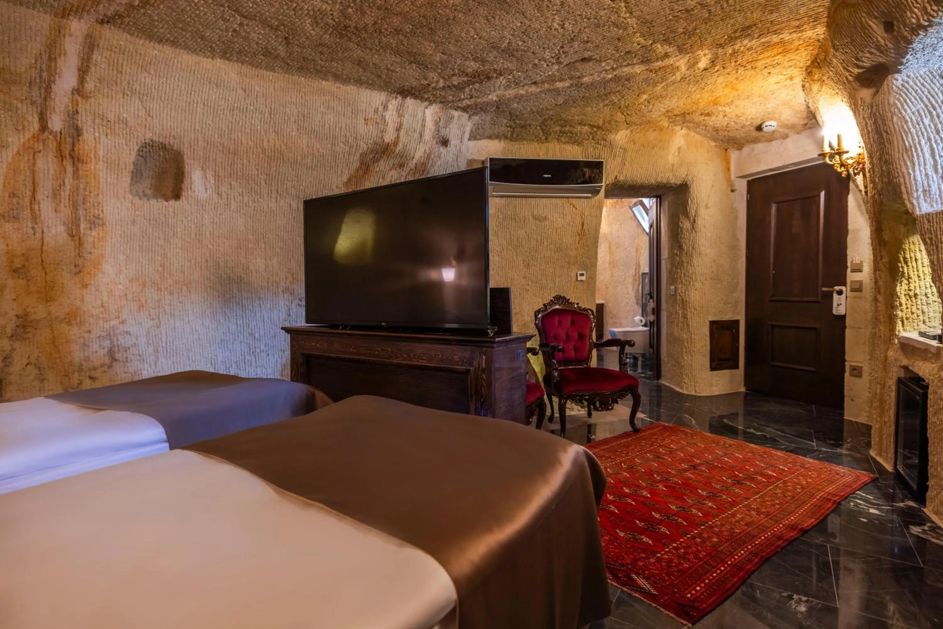 TV and multimedia, Bed in Signature Cave Cappadocia, Trademark Collection by Wyndham