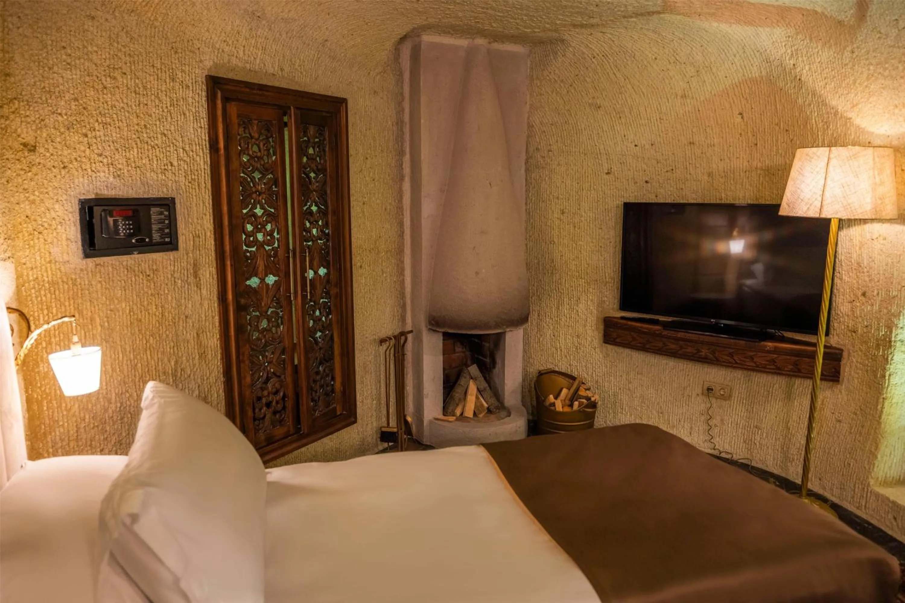 Photo of the whole room, Bed in Signature Cave Cappadocia, Trademark Collection by Wyndham