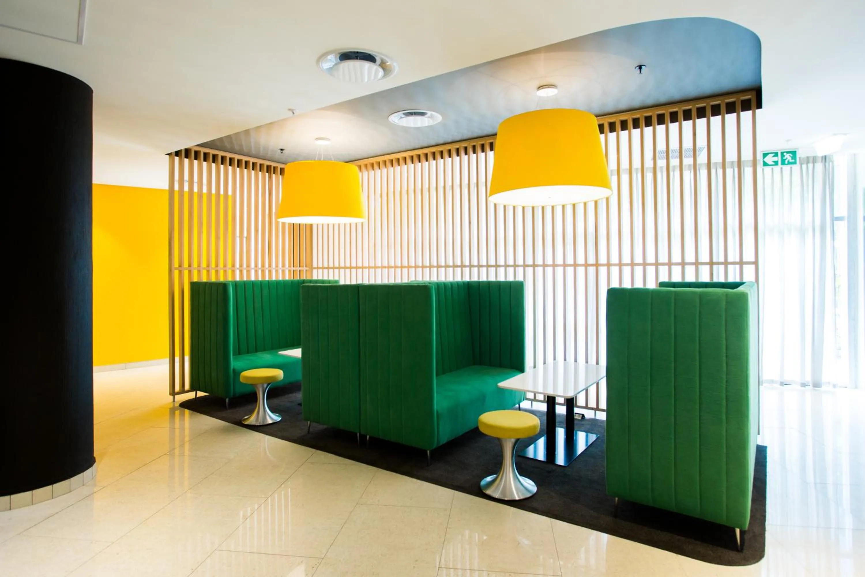 Communal lounge/ TV room in Park Inn by Radisson Libreville