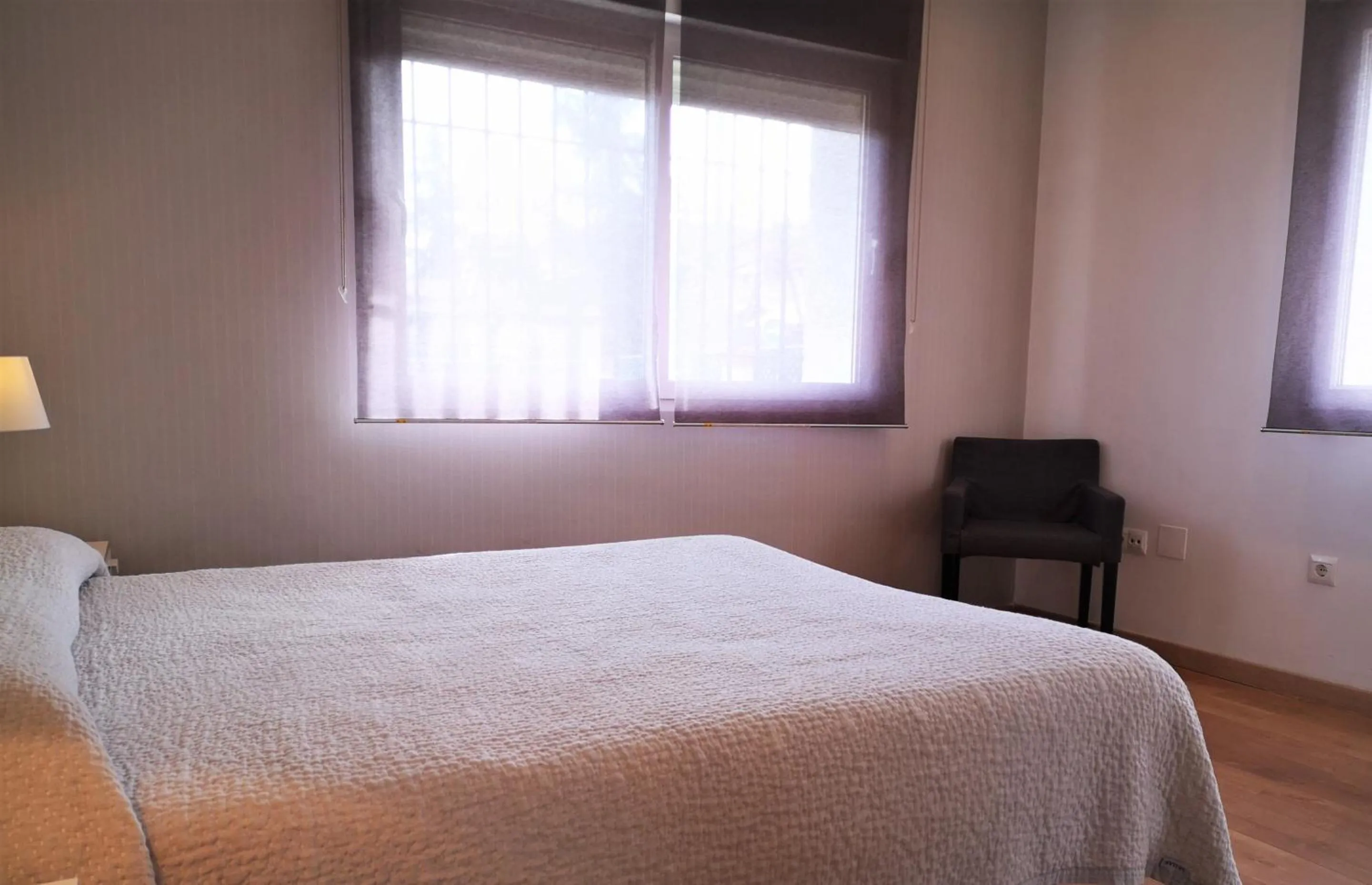 Bedroom, Bed in Apartamentos Ronda Luz