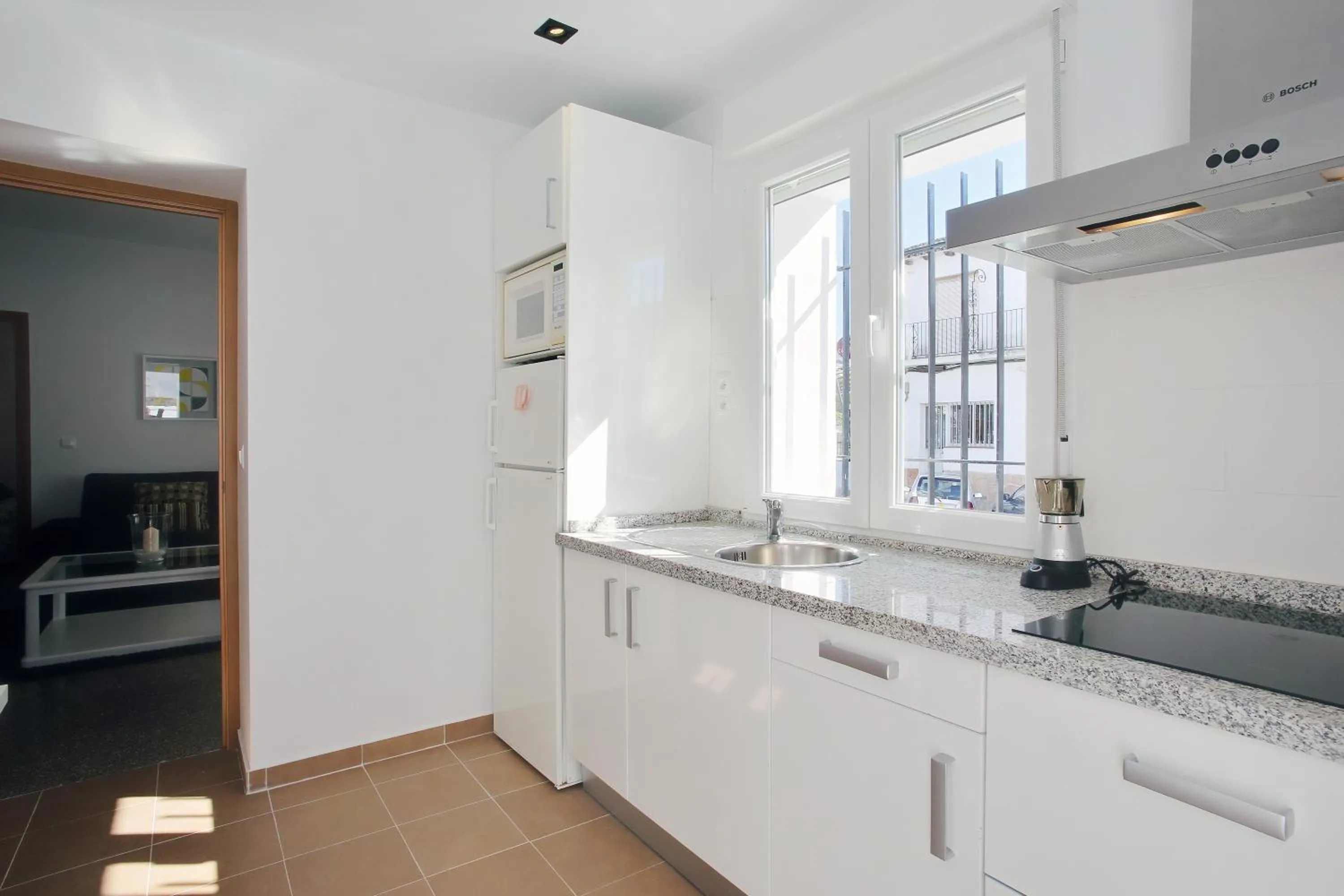Kitchen or kitchenette in Apartamentos Ronda Luz