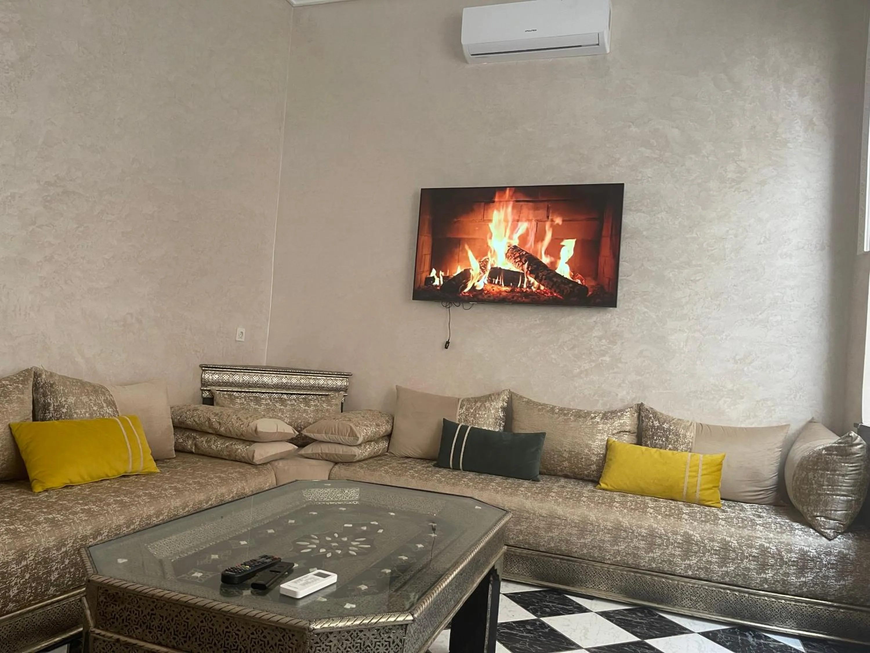 Communal lounge/ TV room in Riad Aya