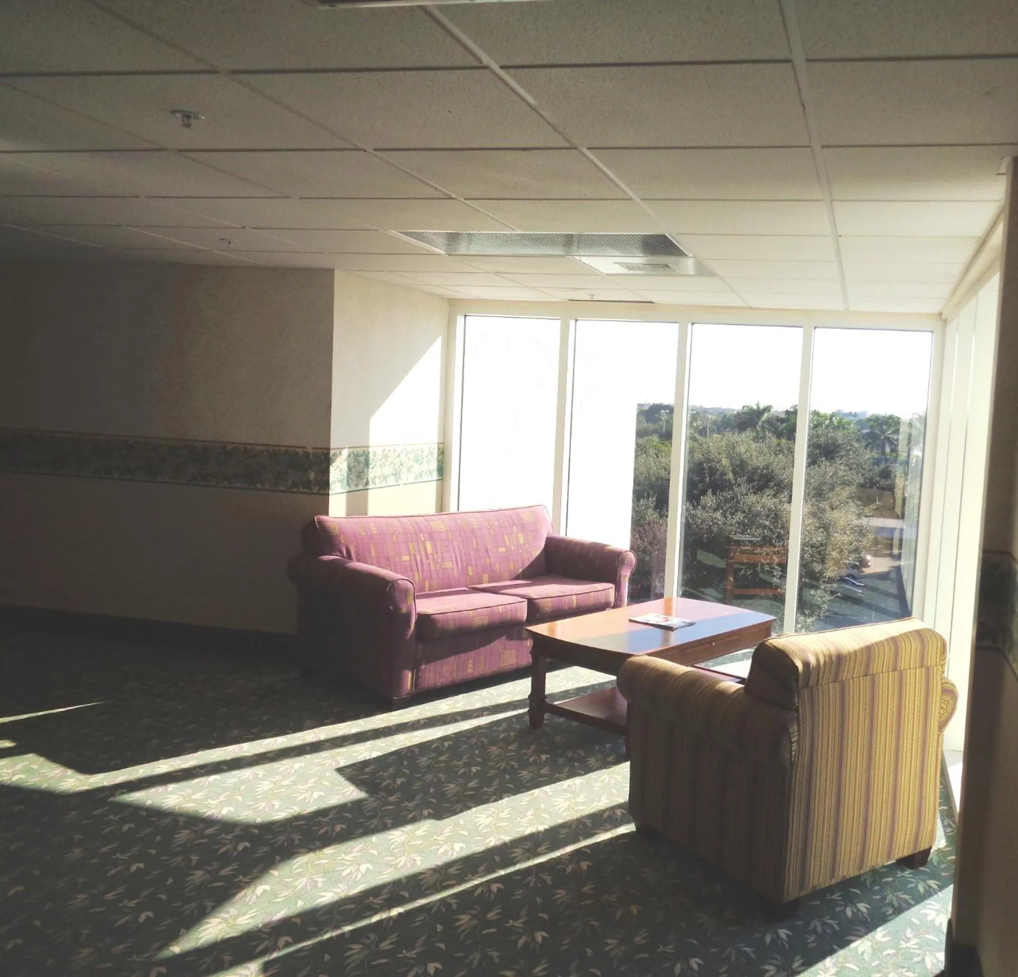 Seating area in Allure Suites of Fort Myers
