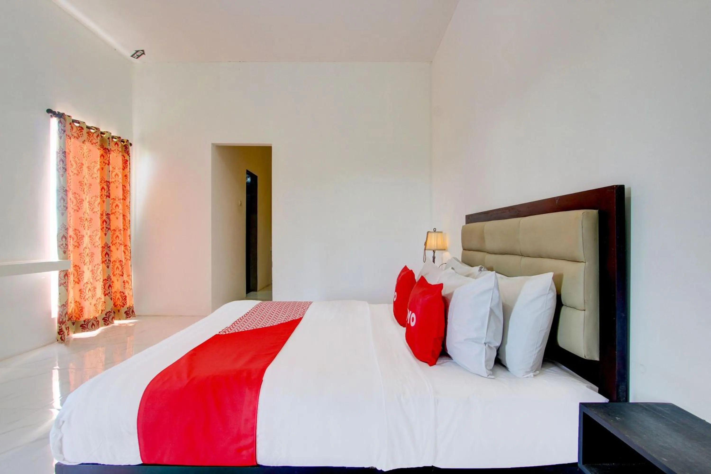 Bedroom in OYO 93885 D'harjo Guesthouse