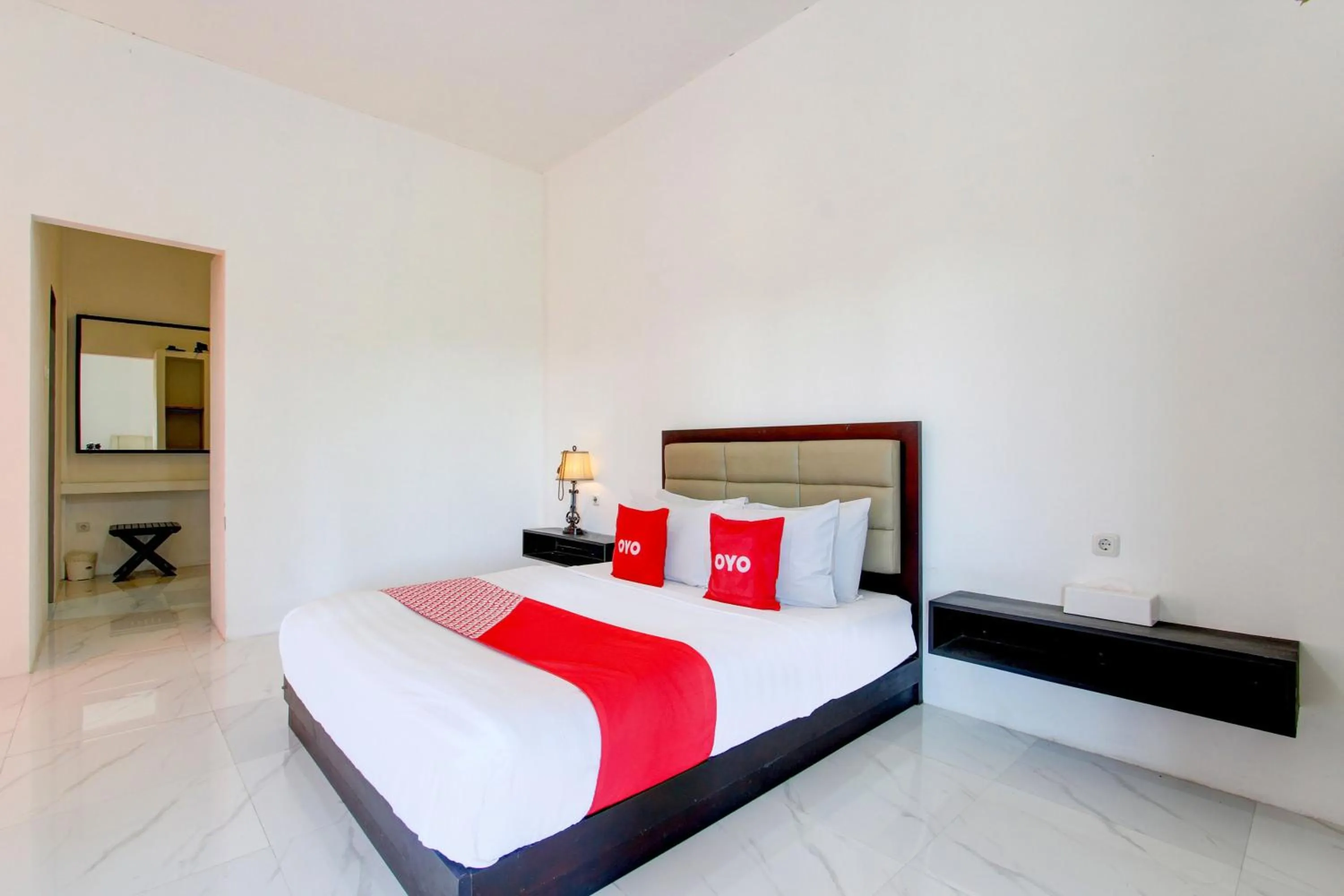 Bedroom in OYO 93885 D'harjo Guesthouse