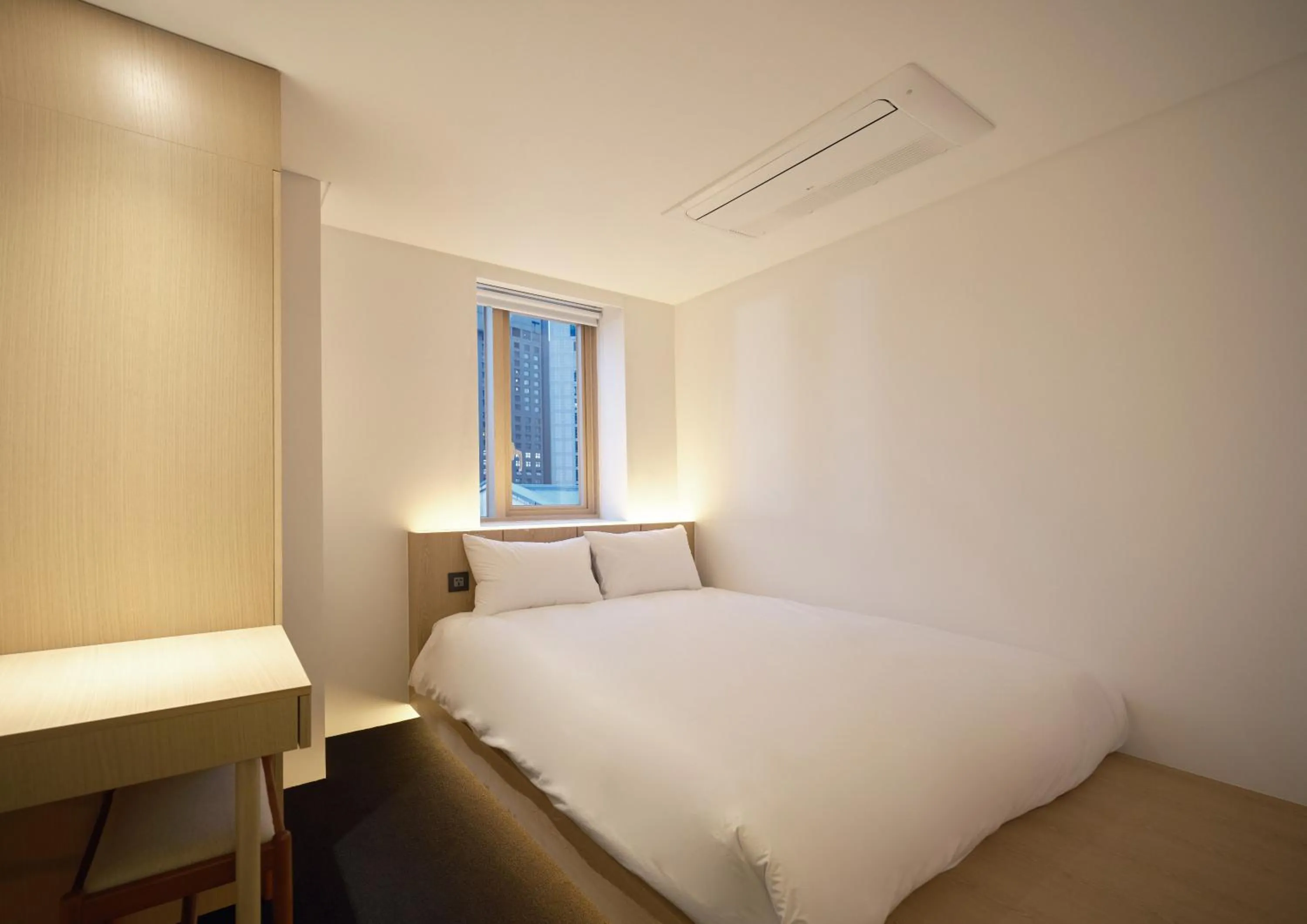 Bed in UH Suite Seoul Deoksugung