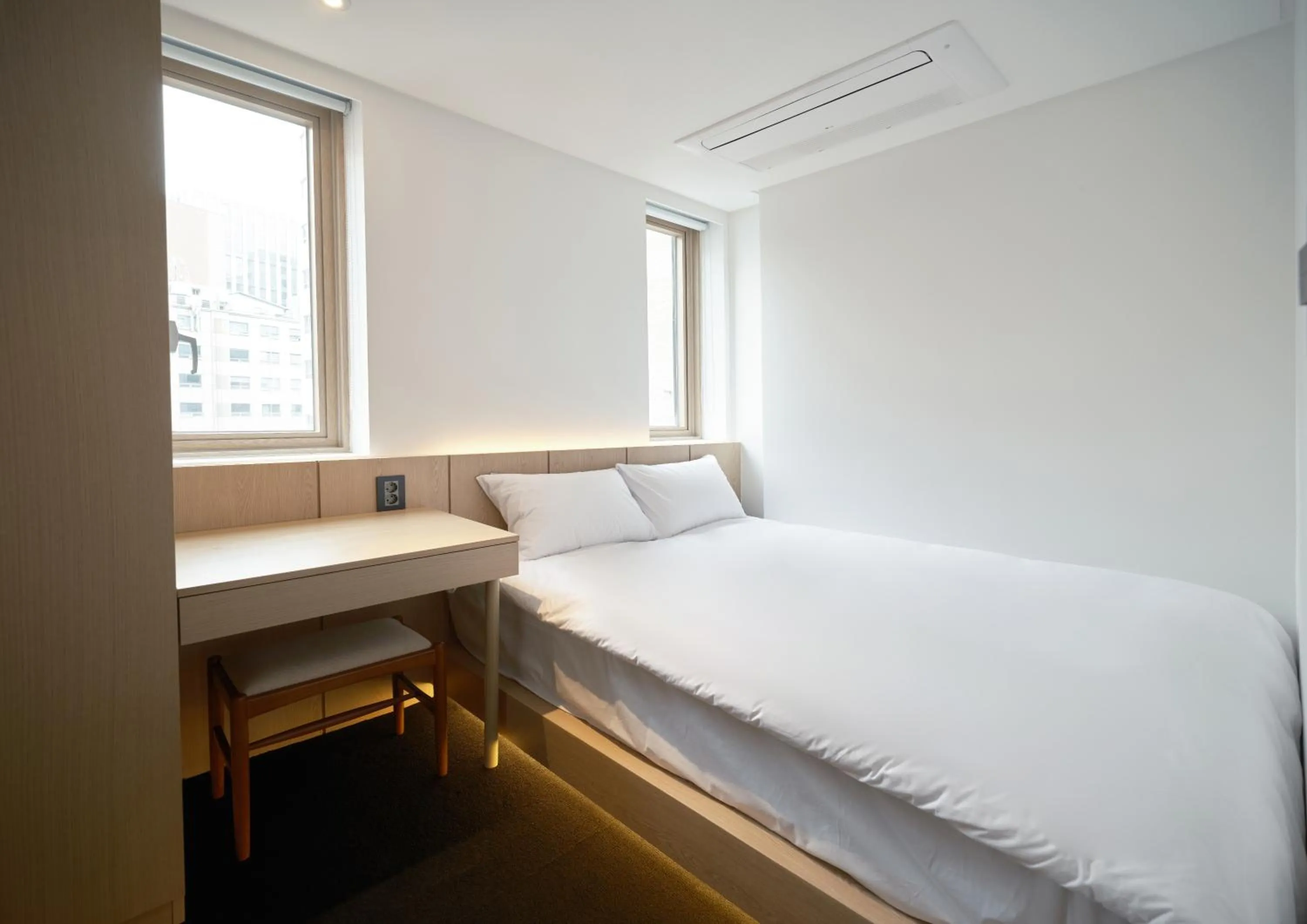 Bed in UH Suite Seoul Deoksugung