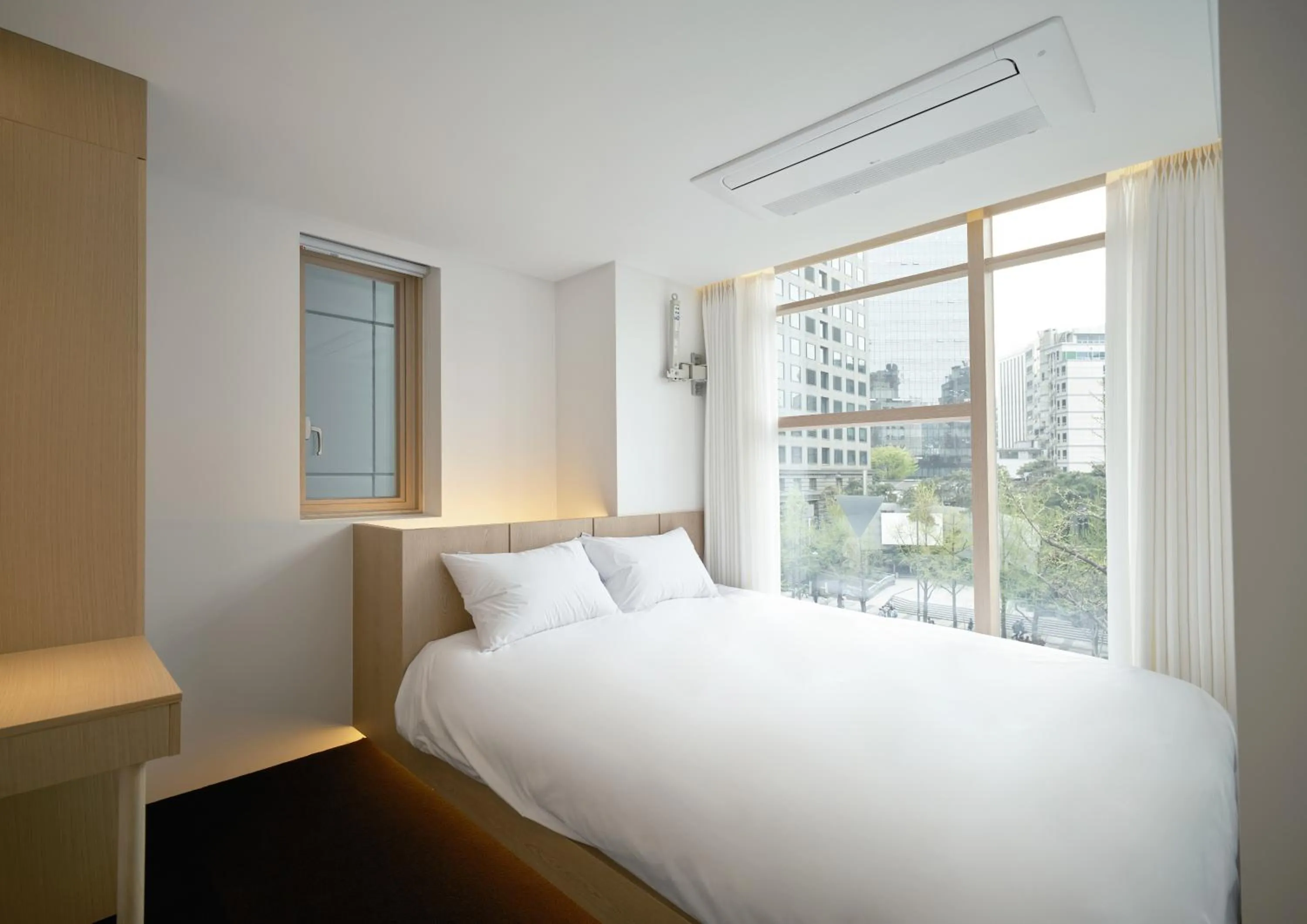 Bed in UH Suite Seoul Deoksugung