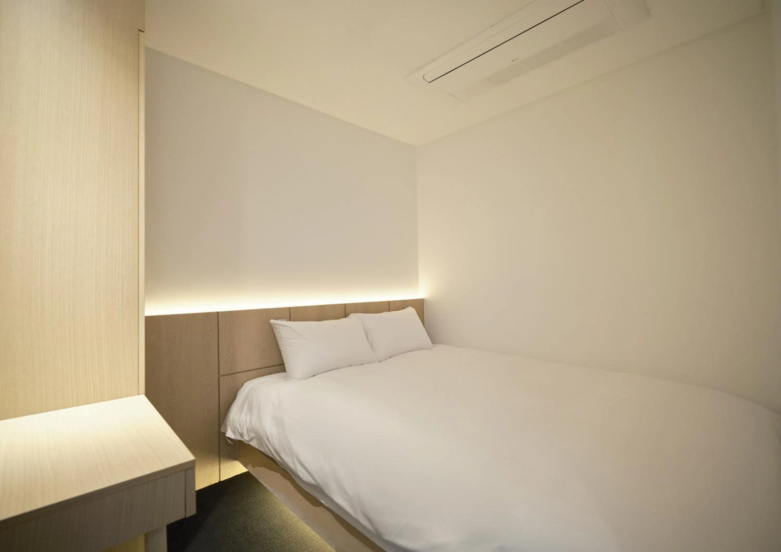 Bed in UH Suite Seoul Deoksugung