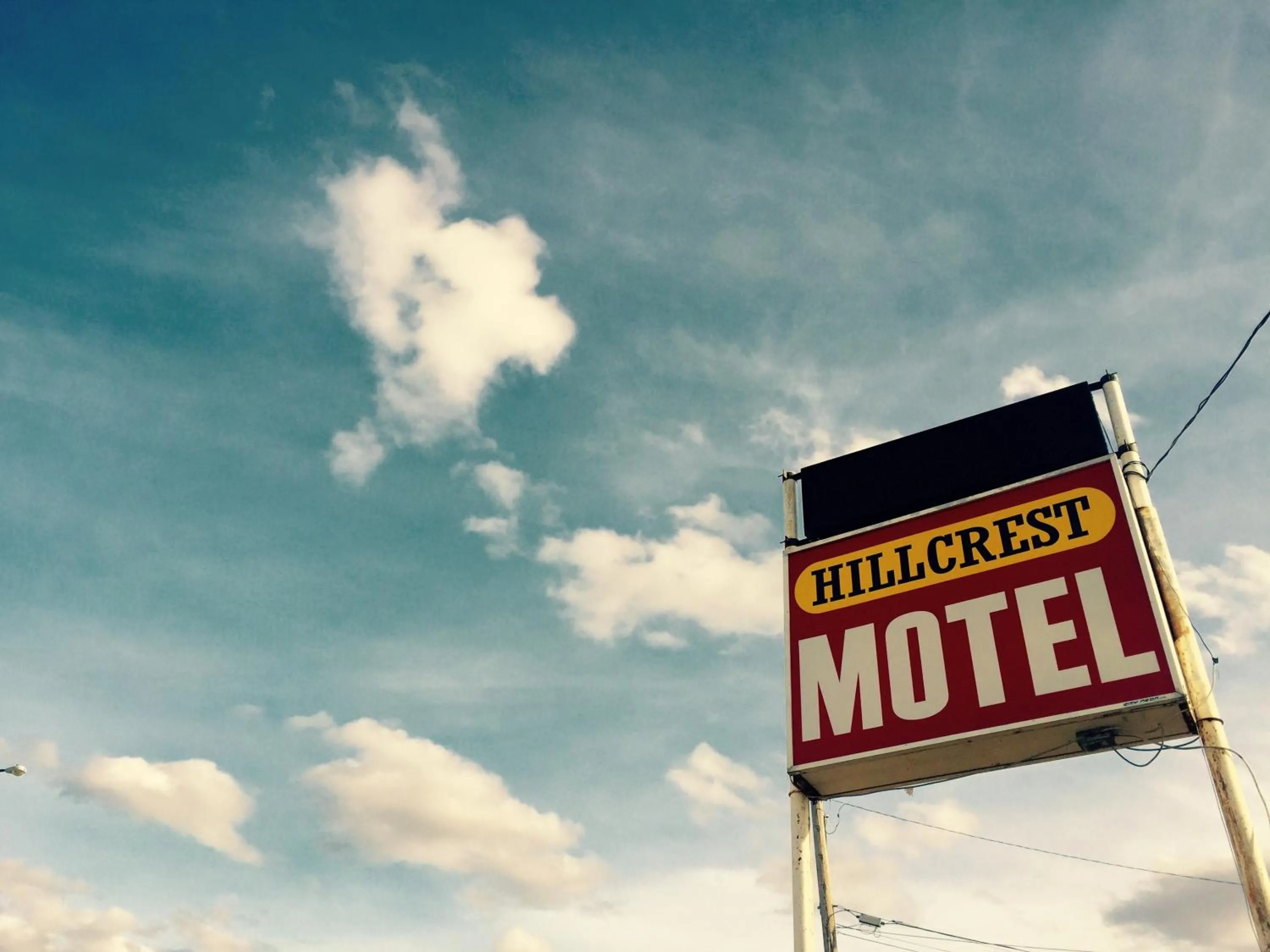 Property logo or sign in Hillcrest Motel