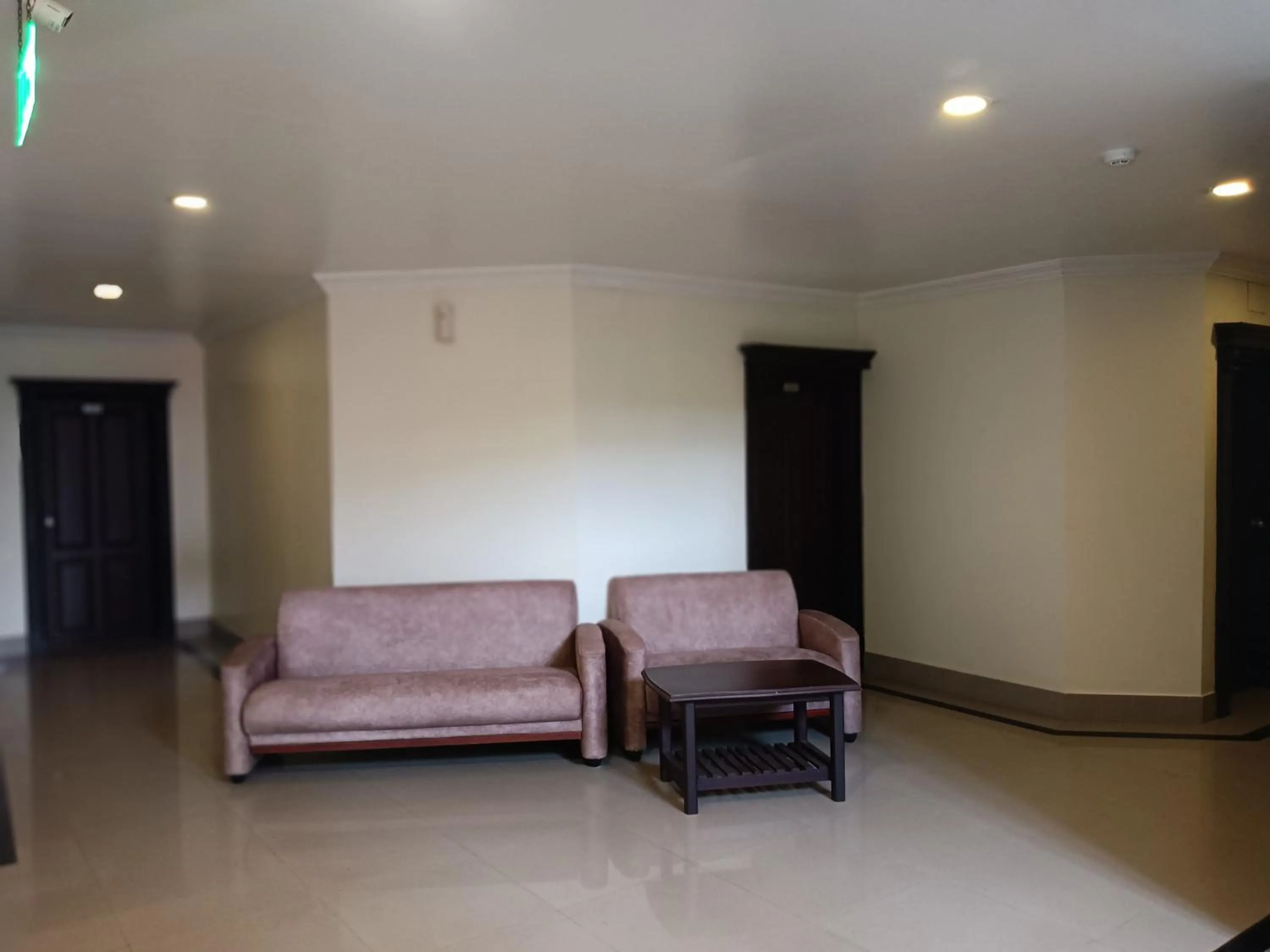 Seating area in Malanadu Tourist Home