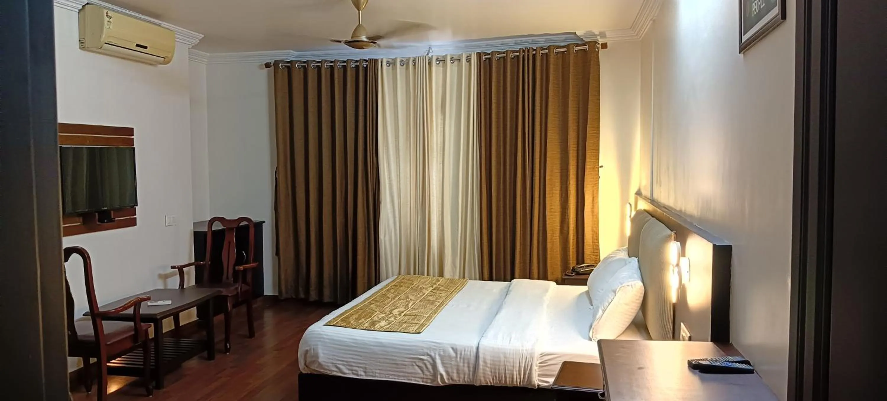 Photo of the whole room, Bed in Malanadu Tourist Home