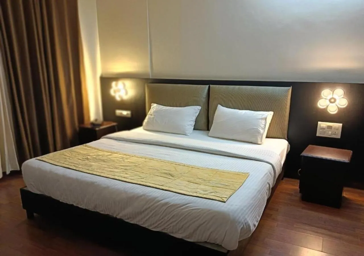 Bed in Malanadu Tourist Home