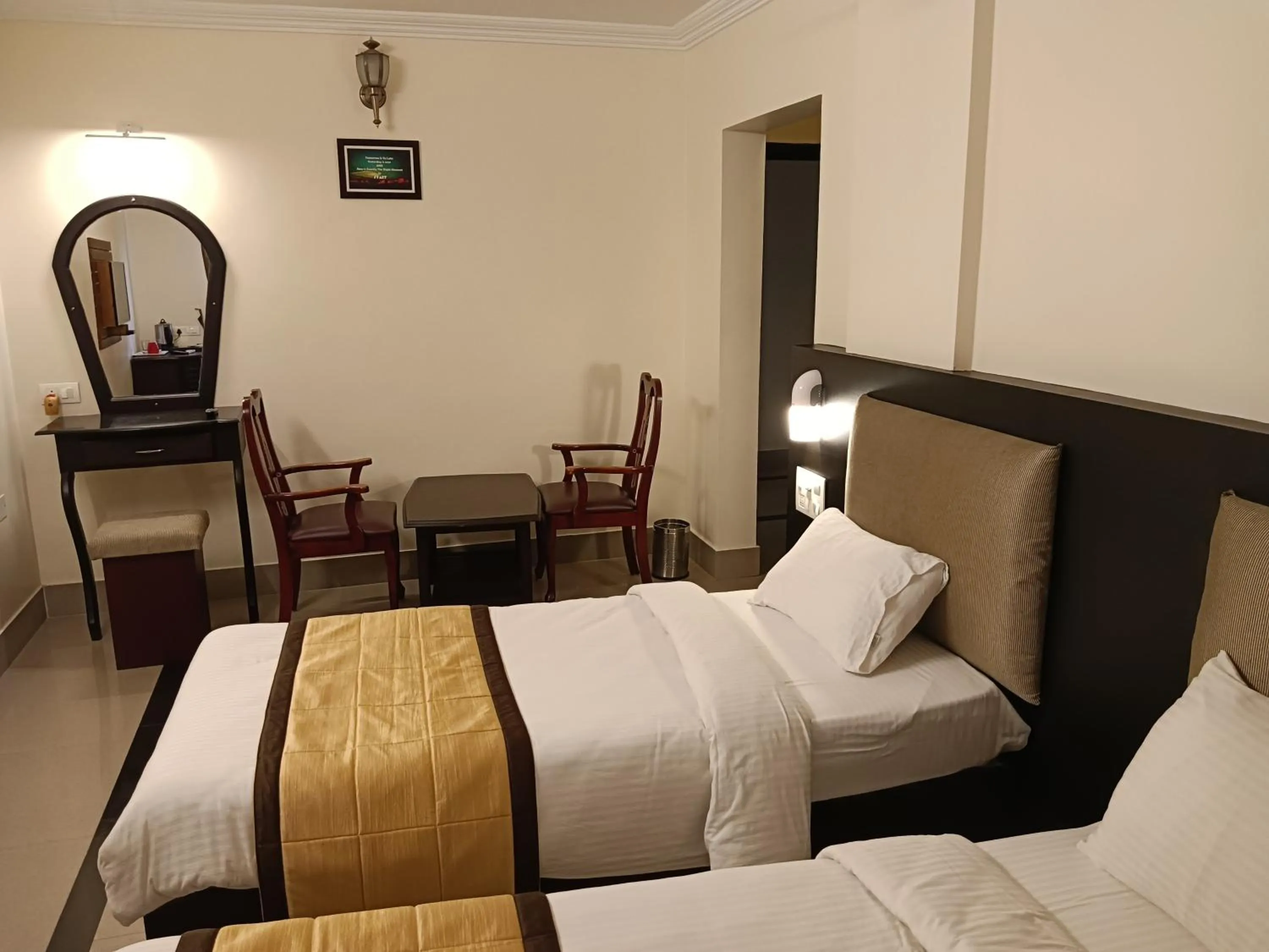 Photo of the whole room, Bed in Malanadu Tourist Home