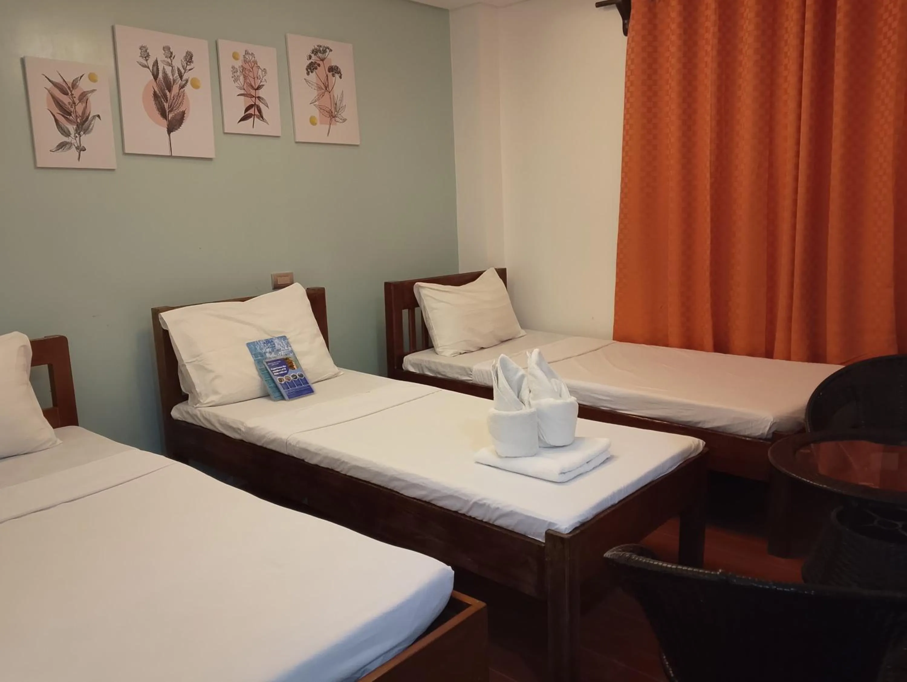 Bed in Aqua Travel Lodge