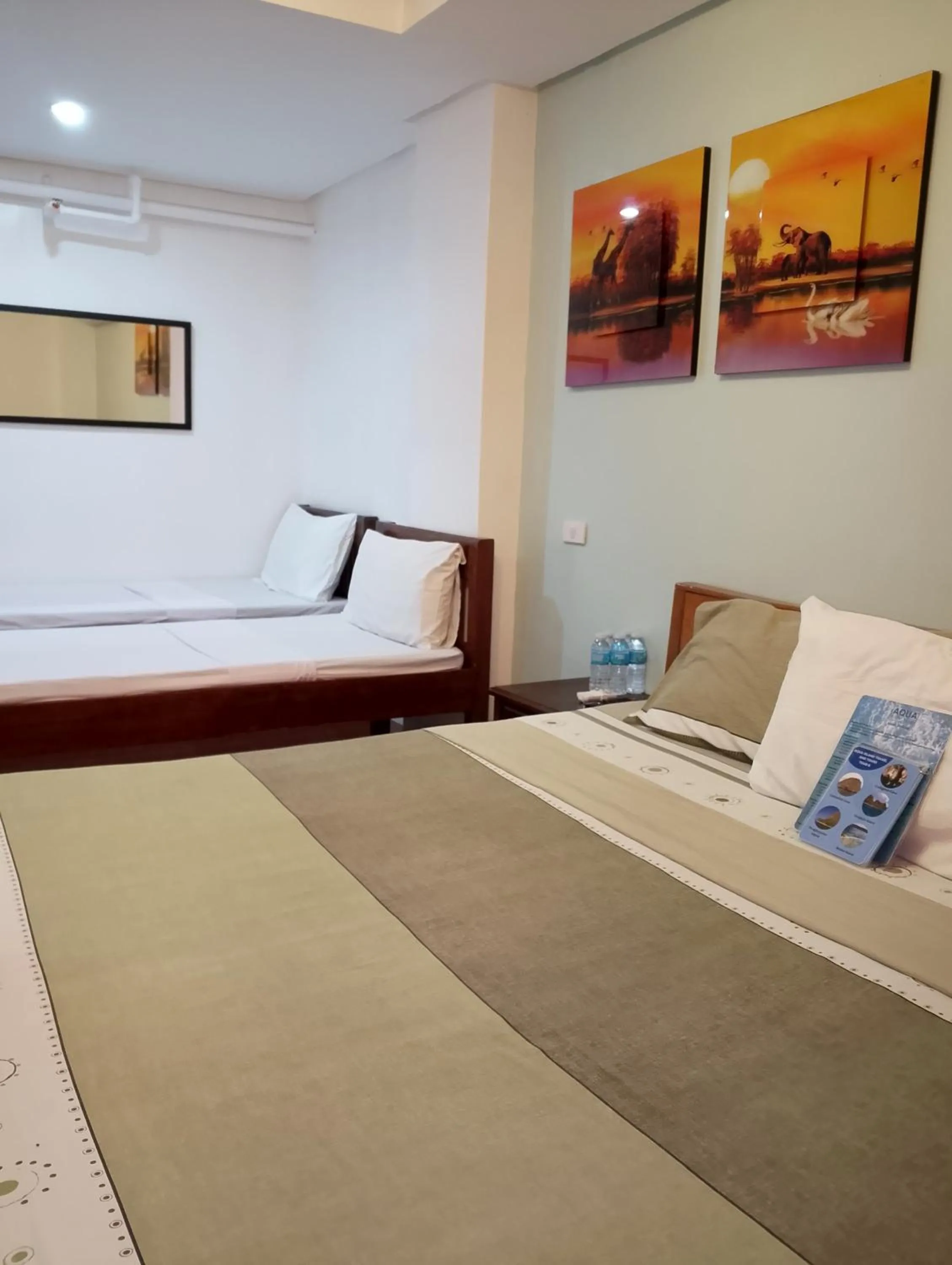 Bed in Aqua Travel Lodge