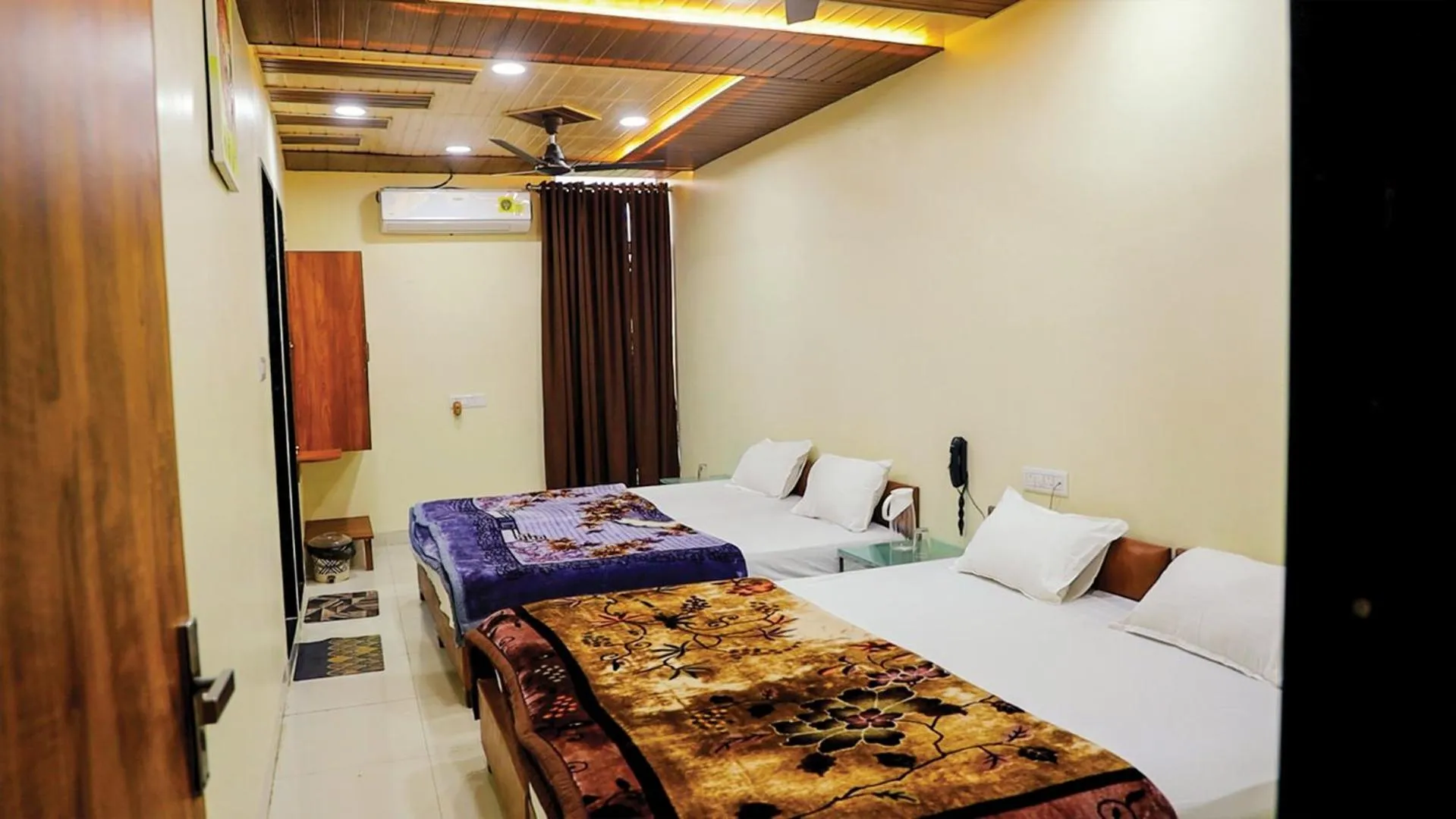 Photo of the whole room, Bed in Shri Shiv Ganga Bhakt Niwas