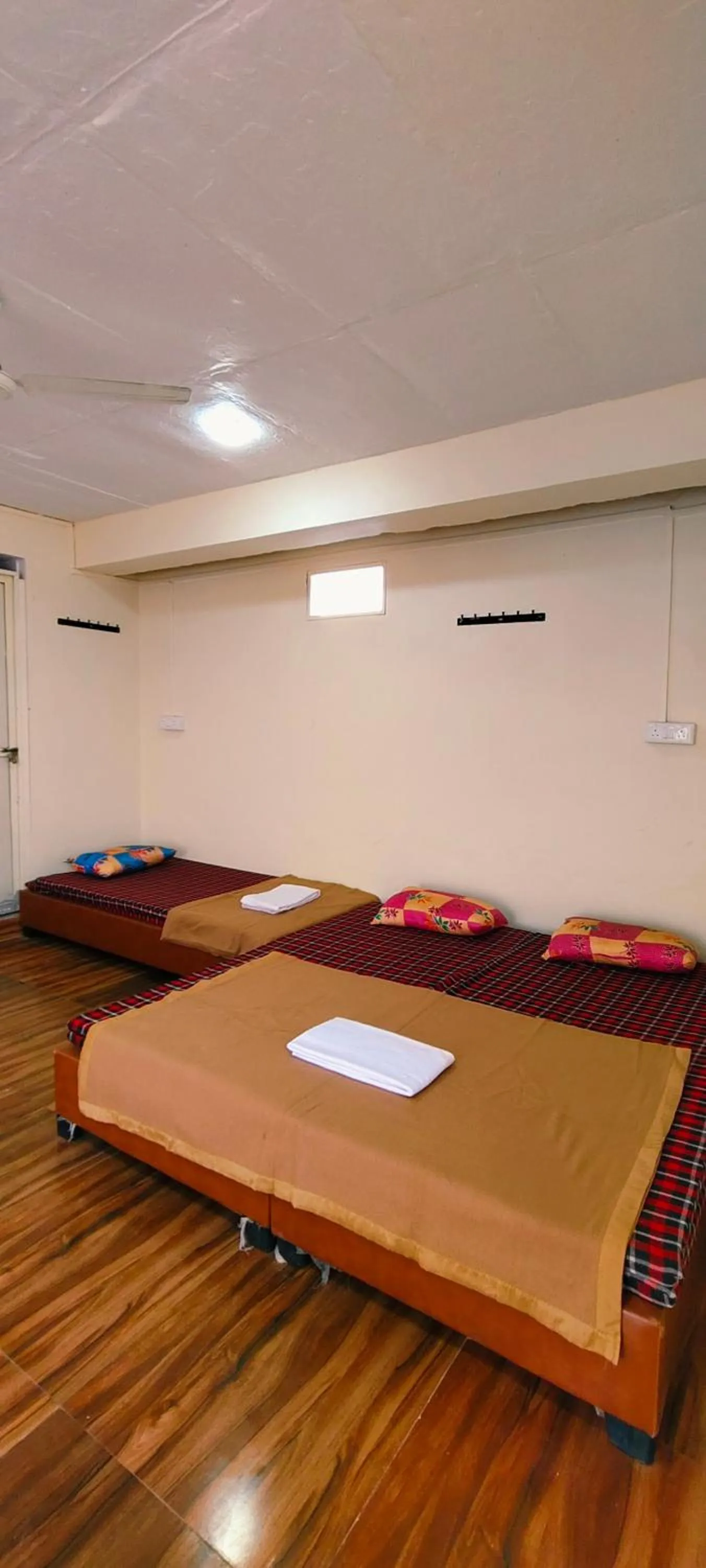Photo of the whole room, Bed in Shri Shiv Ganga Bhakt Niwas