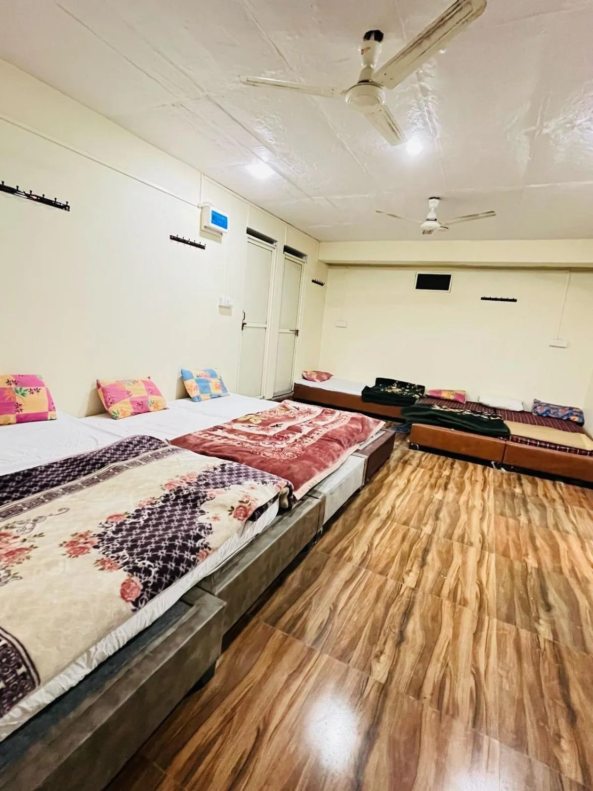 Photo of the whole room, Bed in Shri Shiv Ganga Bhakt Niwas