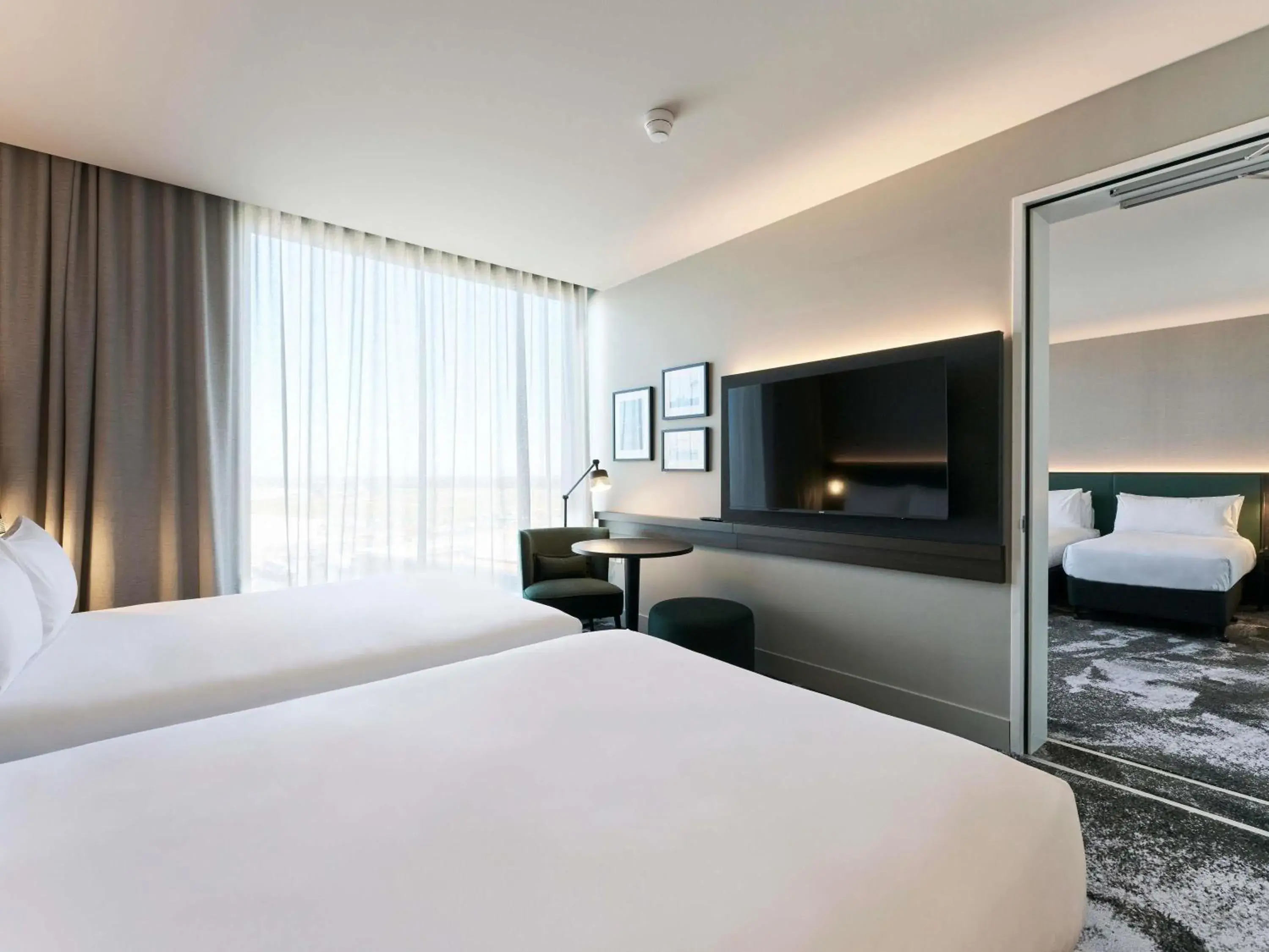 Deluxe Double Room with Two Double Beds in Novotel Melbourne Airport Deluxe Double Room with Two Double Beds in Novotel Melbourne Airport