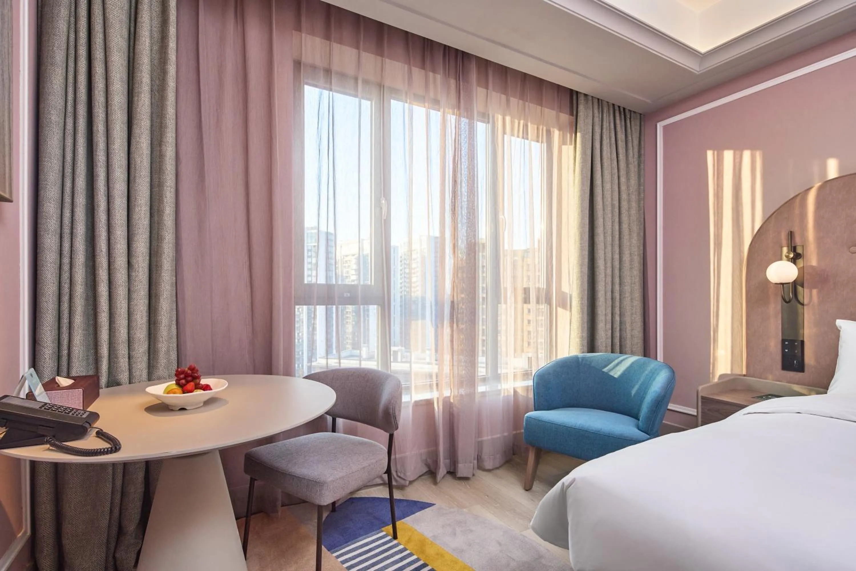 Seating area, Bed in Mercure Yiwu International Trade City
