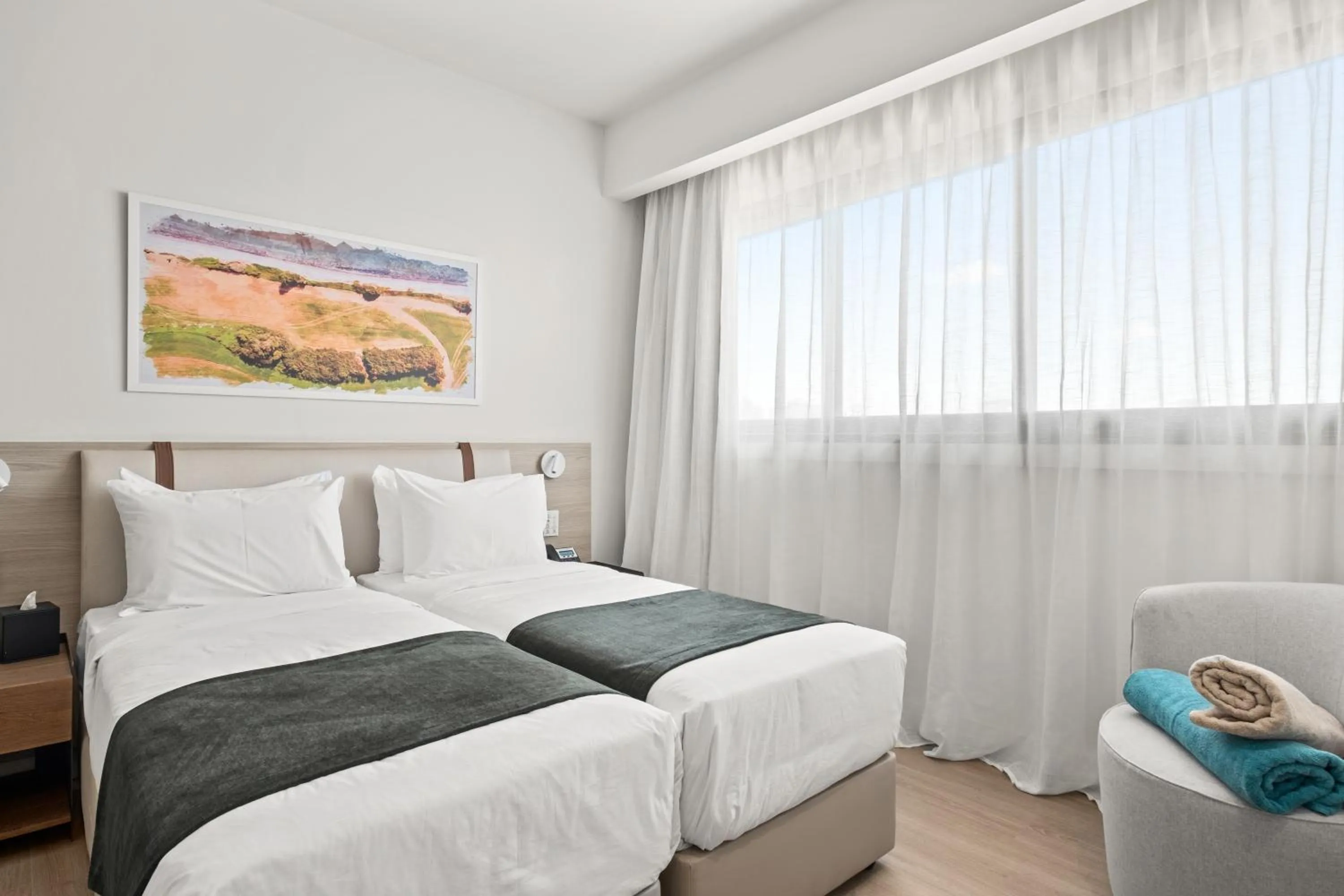 Bed in Mercure Larnaca Finikoudes Beach