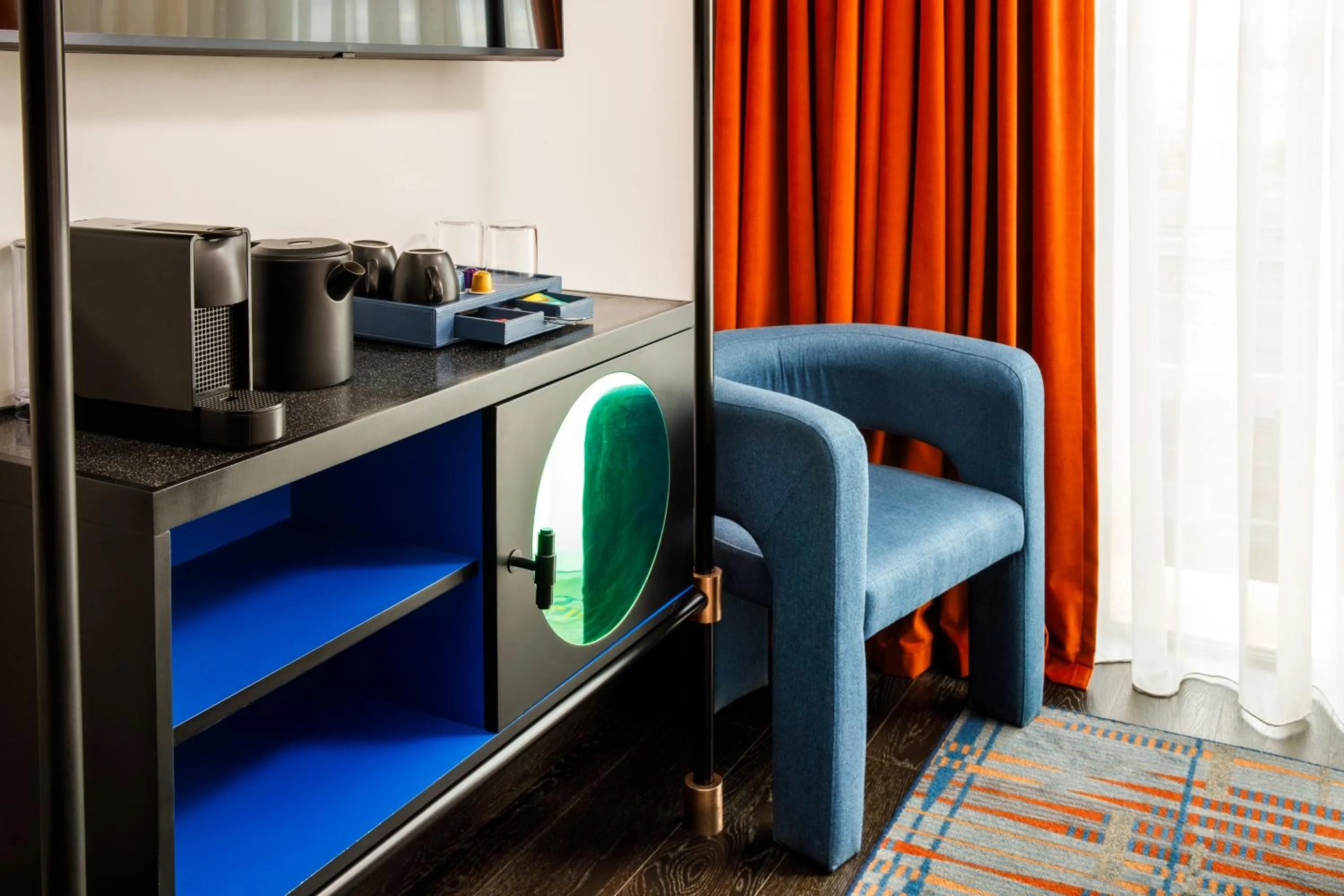 Seating area in TRIBE Manchester Airport by Accor