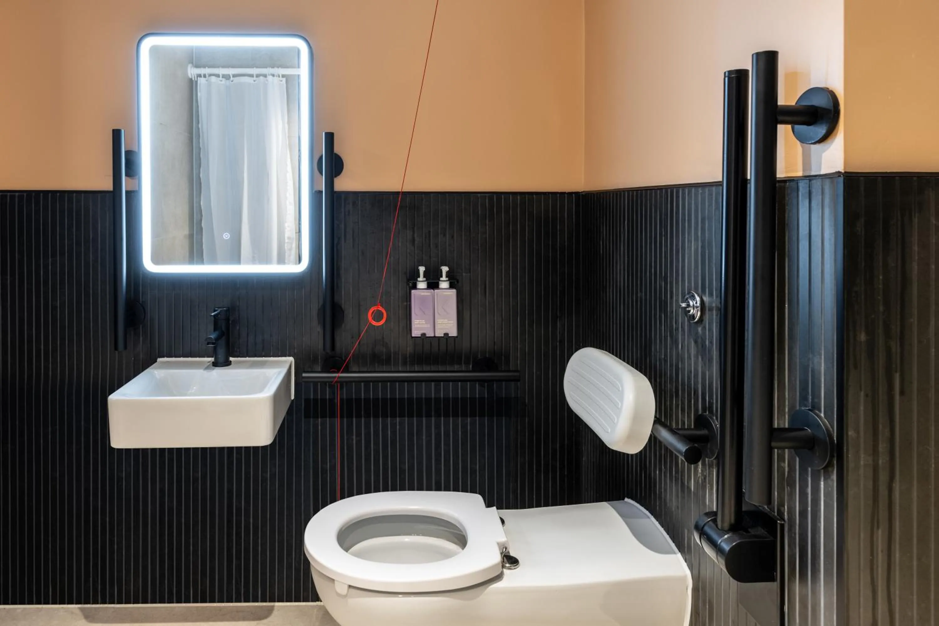 Toilet in TRIBE Manchester Airport by Accor
