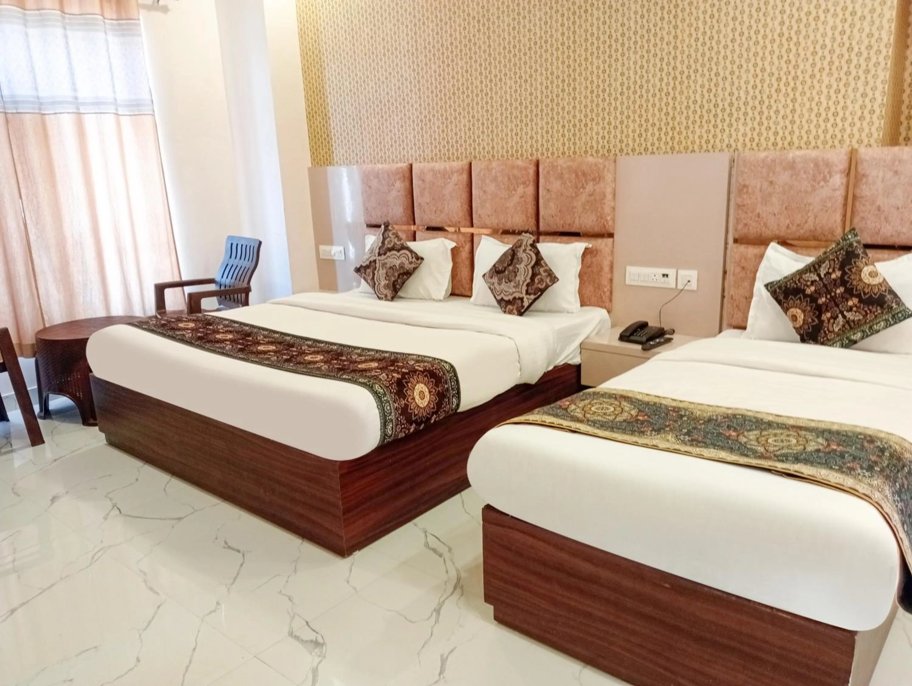 Bed in FabHotel Lohgarh Inn