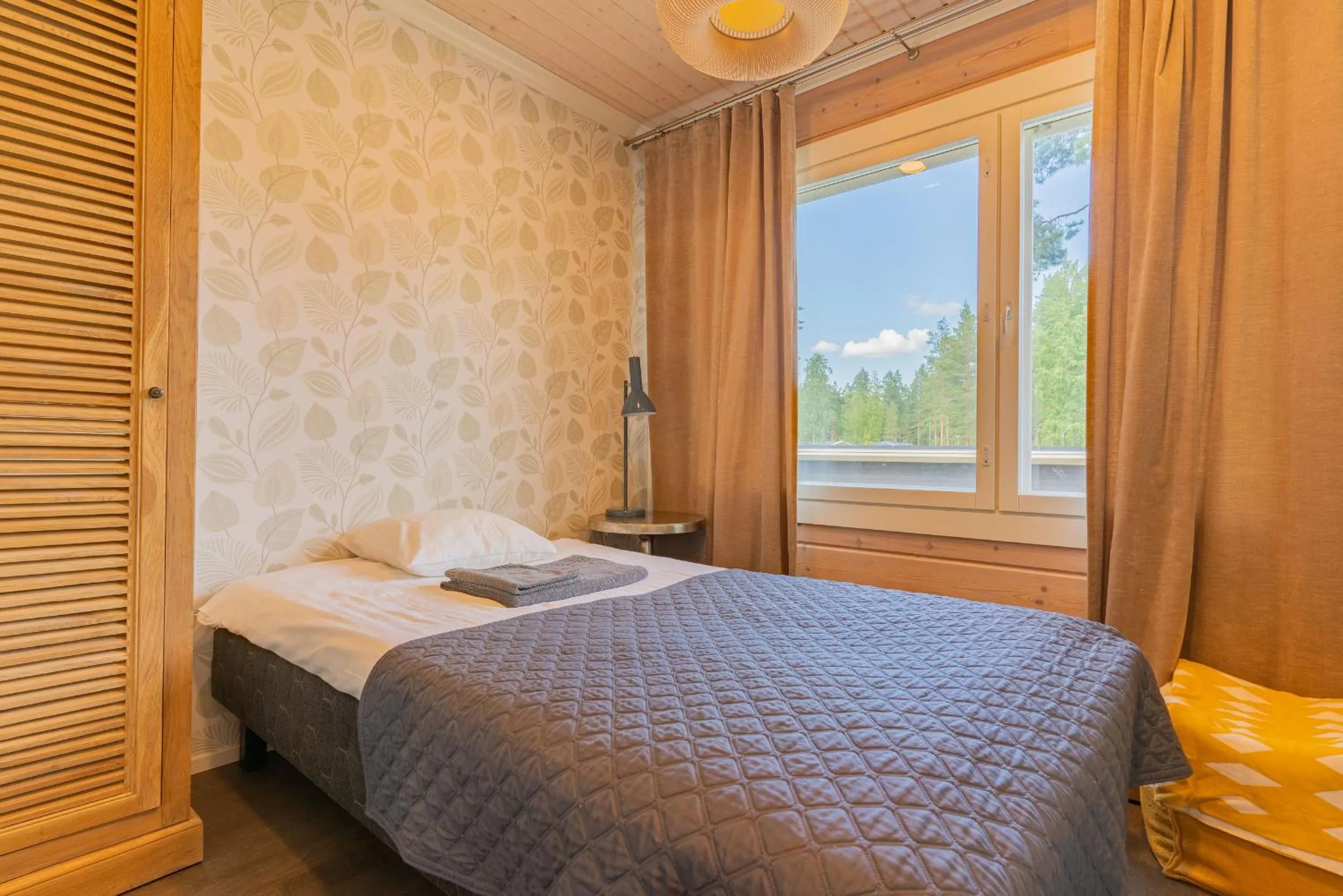 Bed in Saimaa Life Apartments