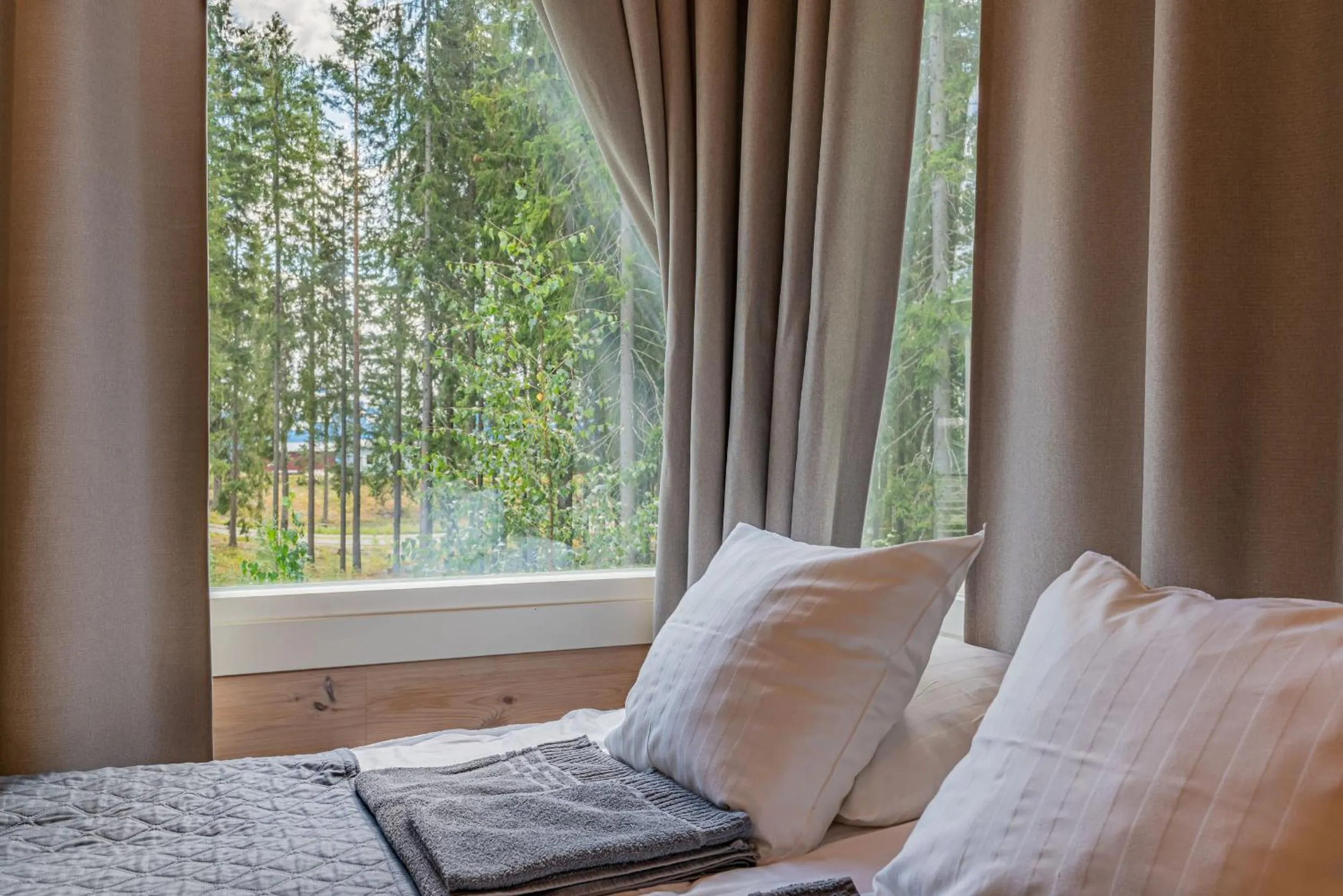 Bed in Saimaa Life Apartments