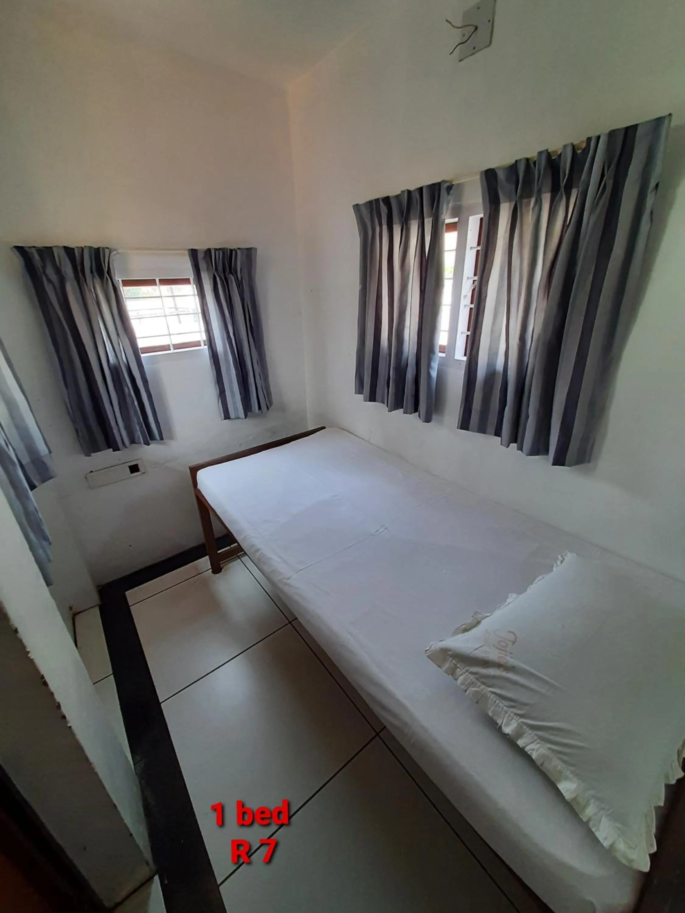 Bed in Jojies Homestay Fortkochi