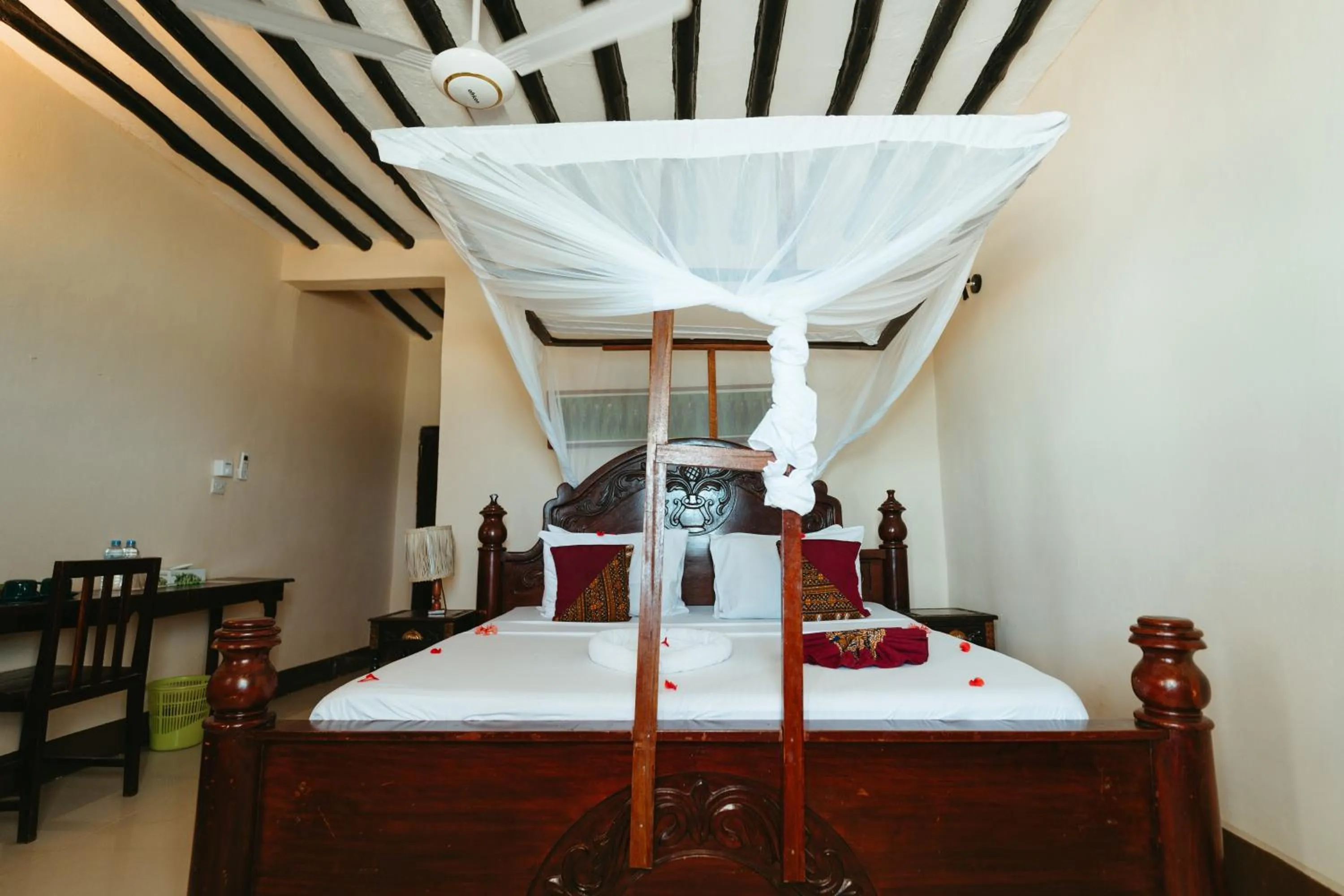 Bed in Amaan Beach Bungalows
