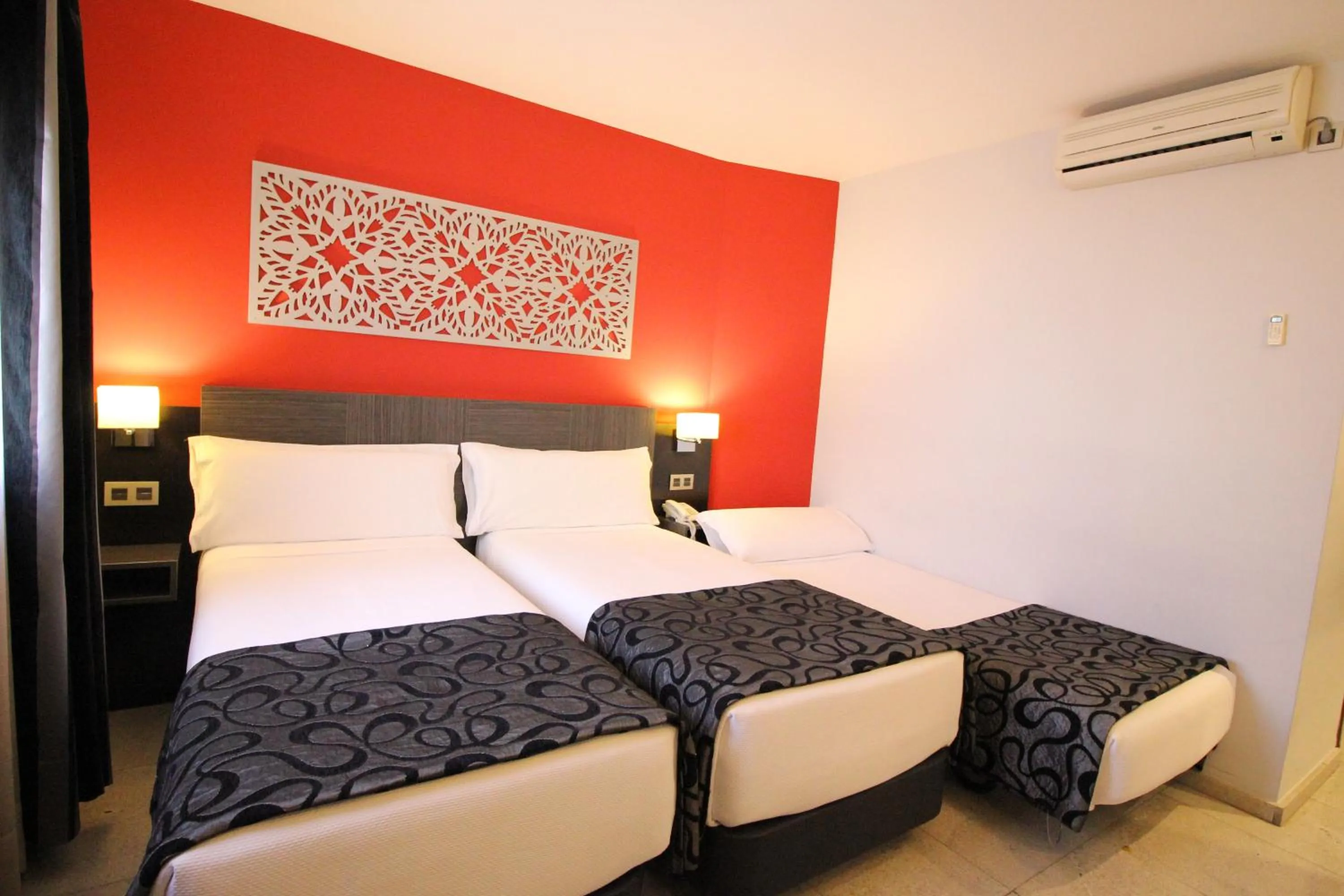 Bed in Hotel Venecia