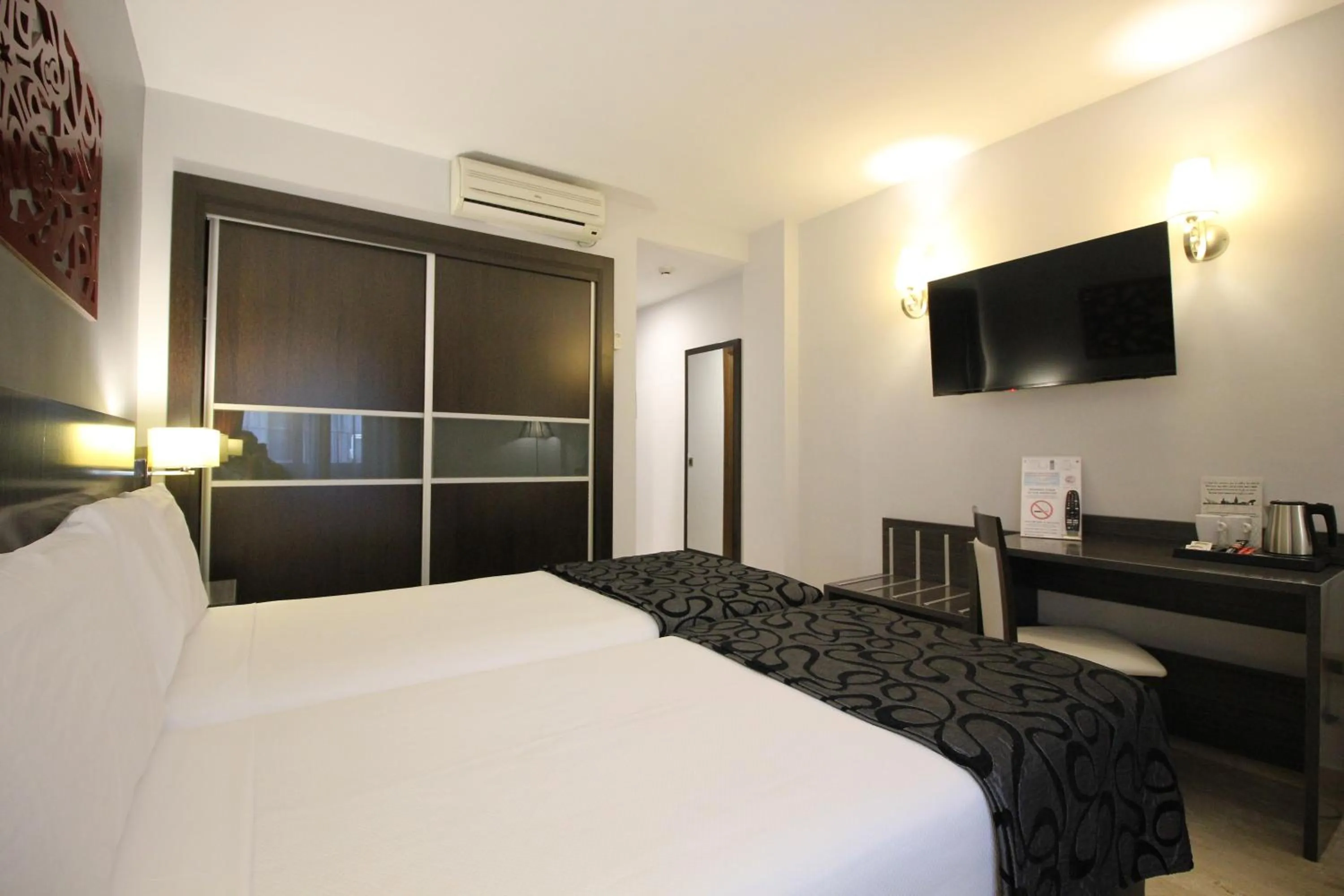 Bed in Hotel Venecia