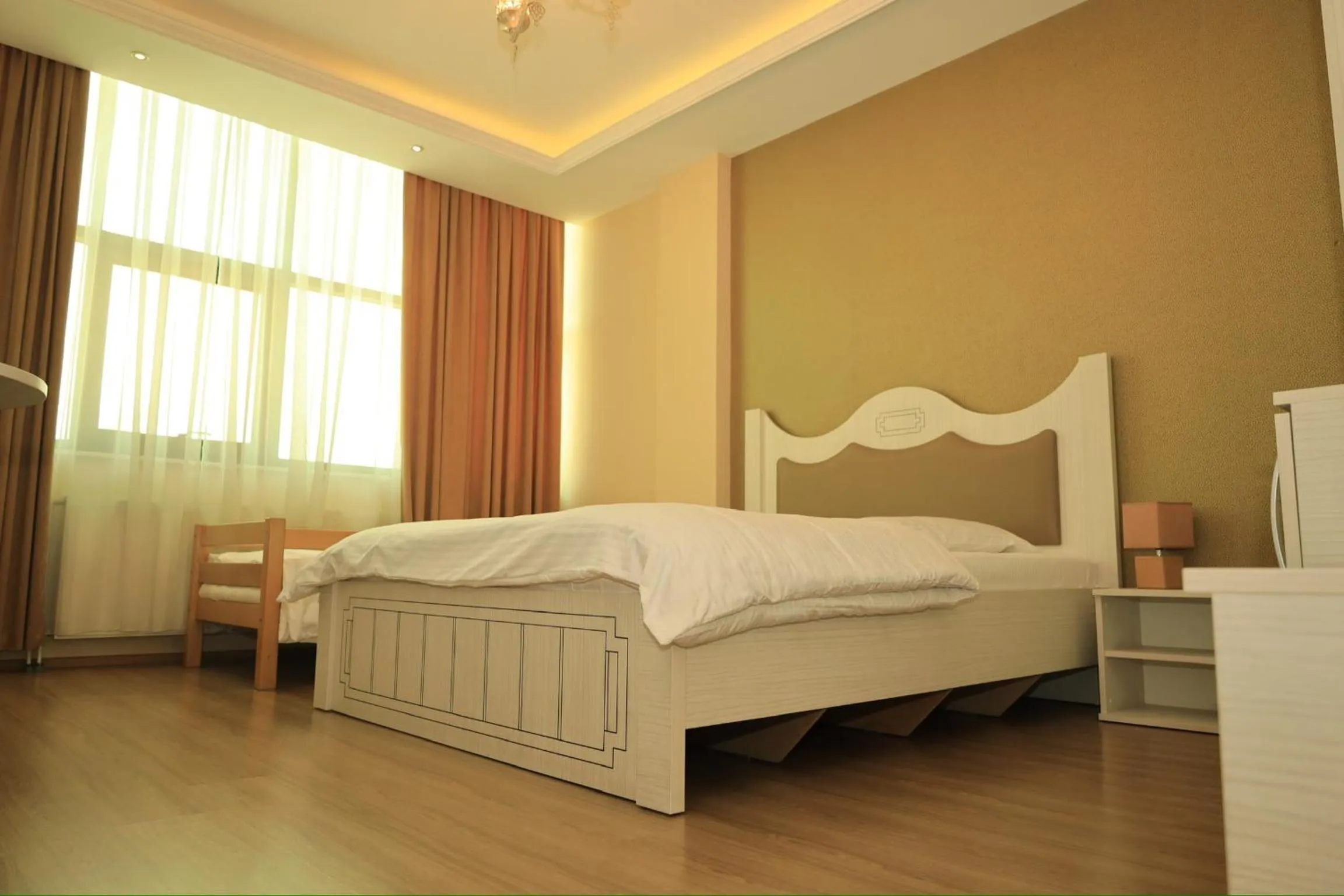 Bed in Hotel Antika