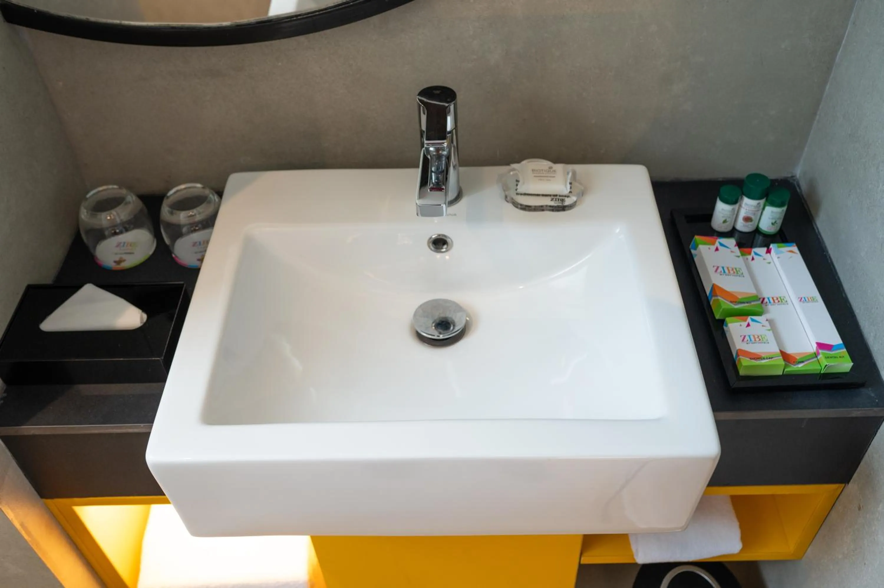 Bathroom in ZIBE Luxe Kakinada by GRT Hotels