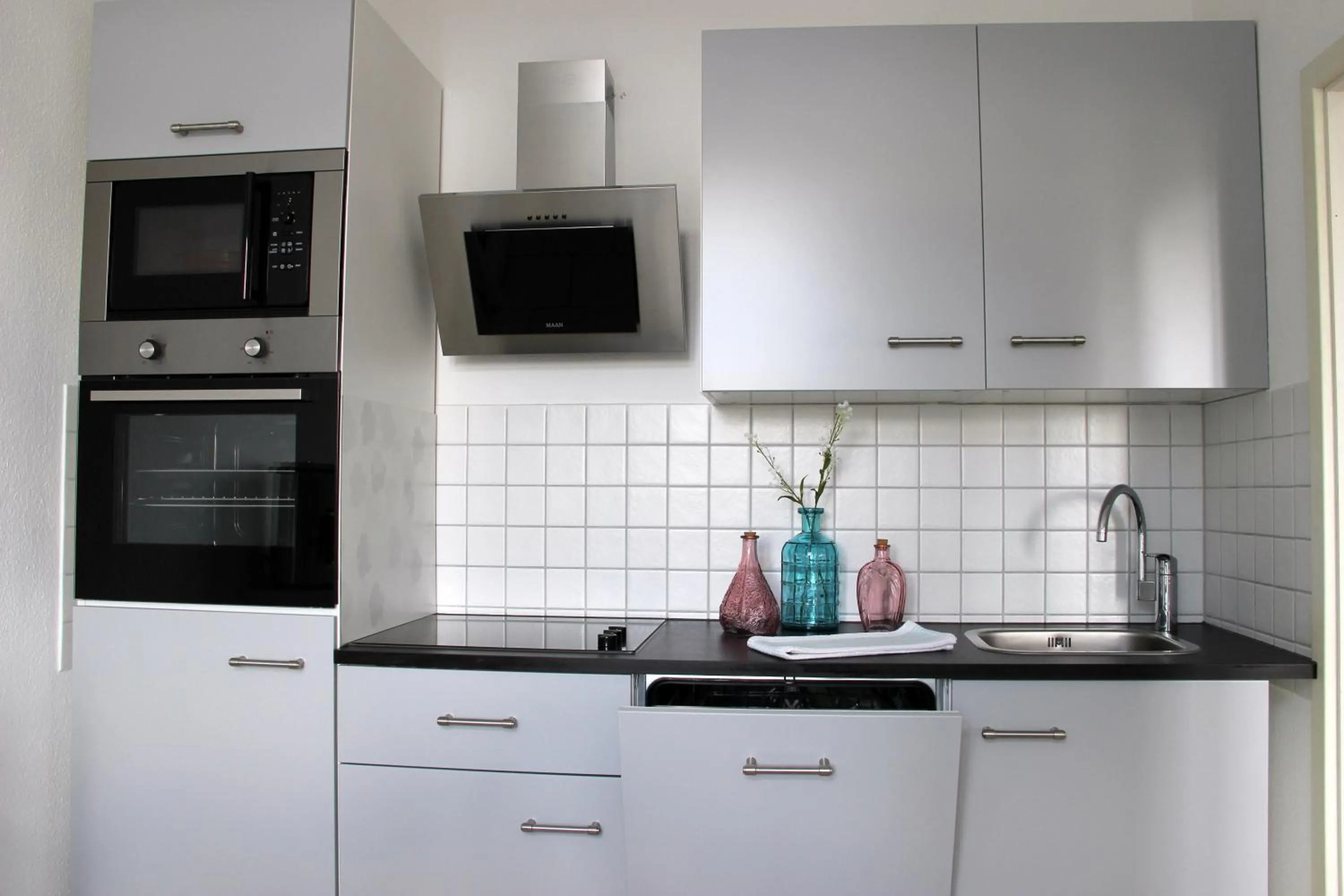 Kitchen or kitchenette in Leon Apartments