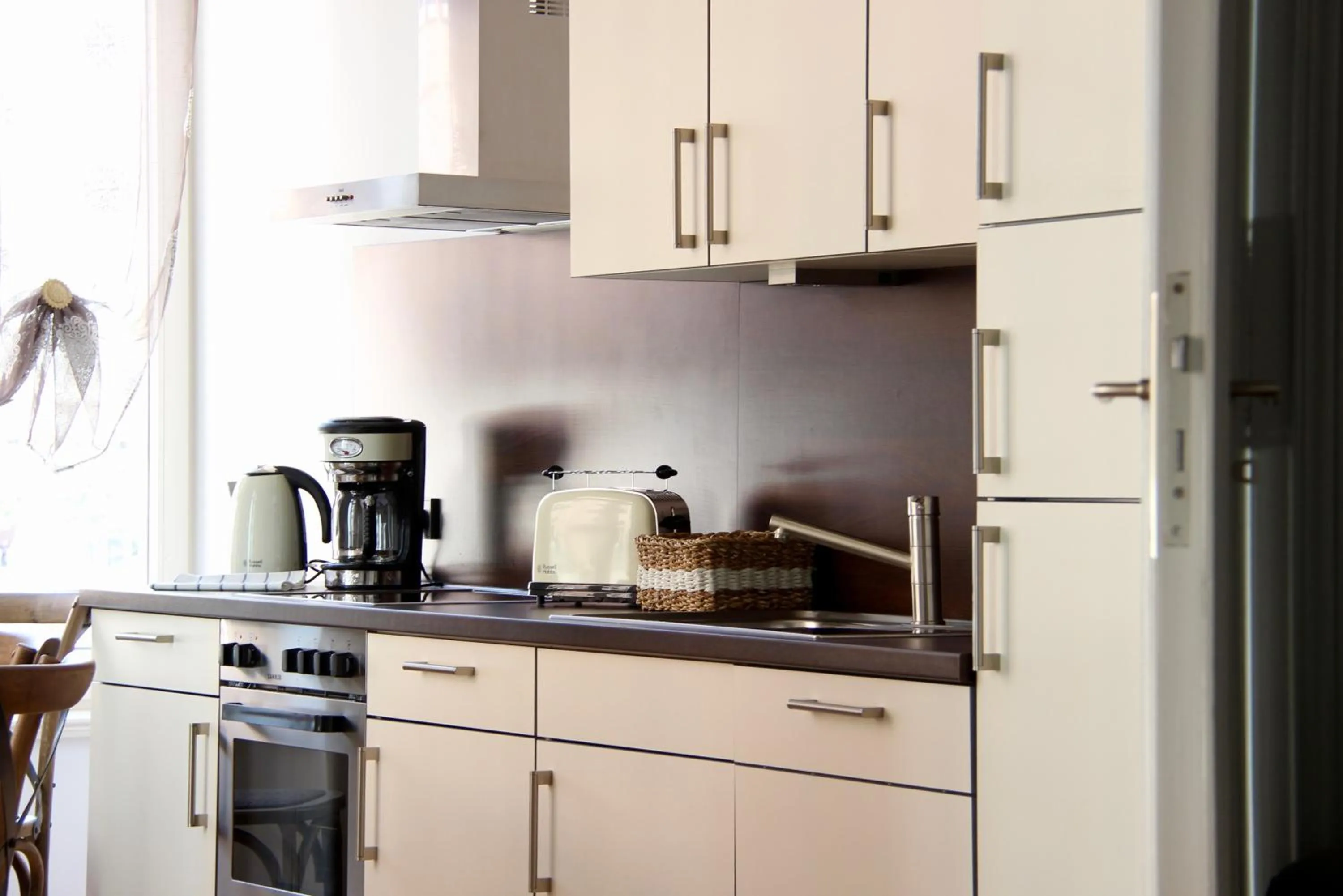 Kitchen or kitchenette in Leon Apartments