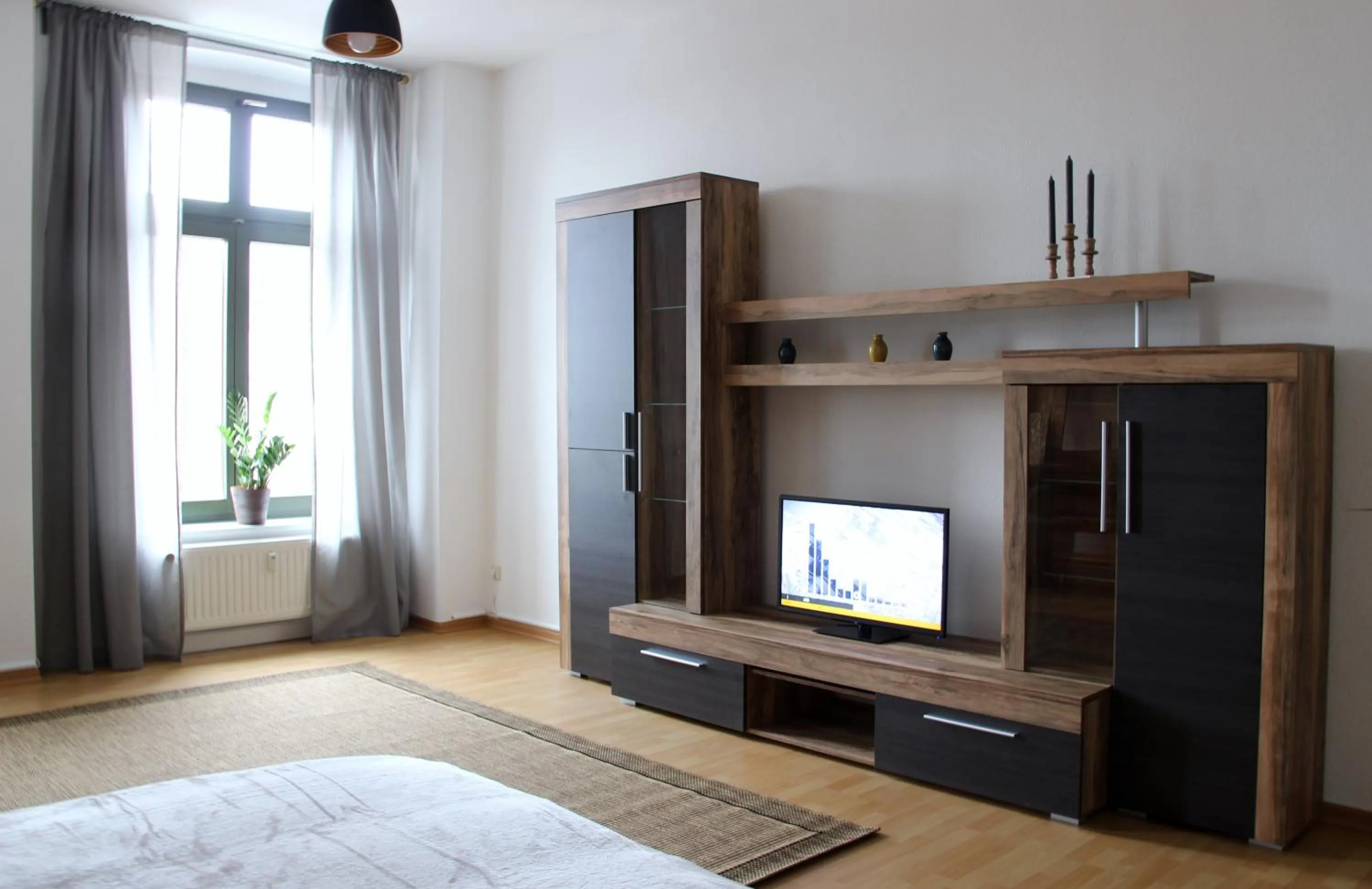 Living room, Bed in Leon Apartments