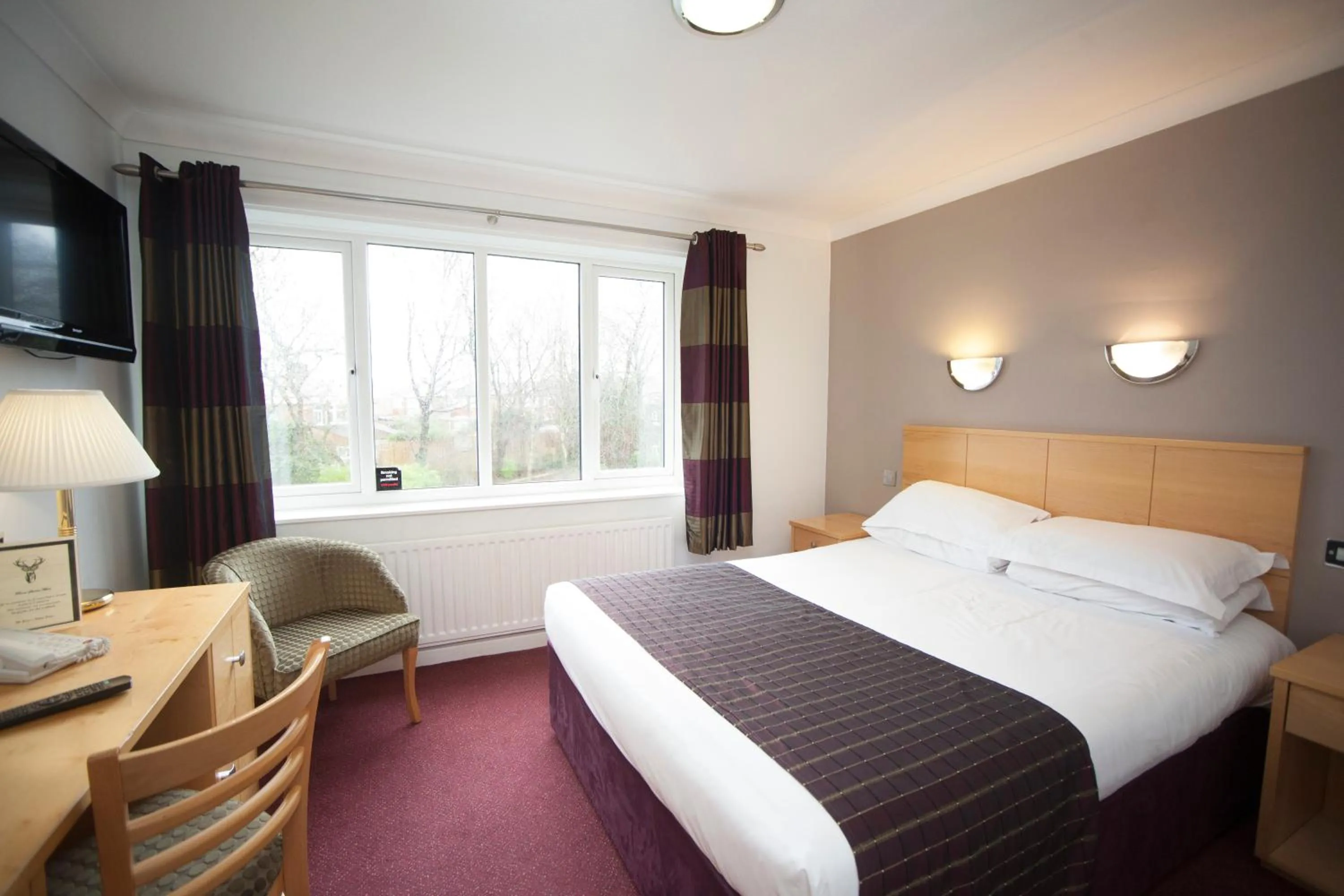 Bedroom in The Victoria Hotel Manchester by Compass Hospitality