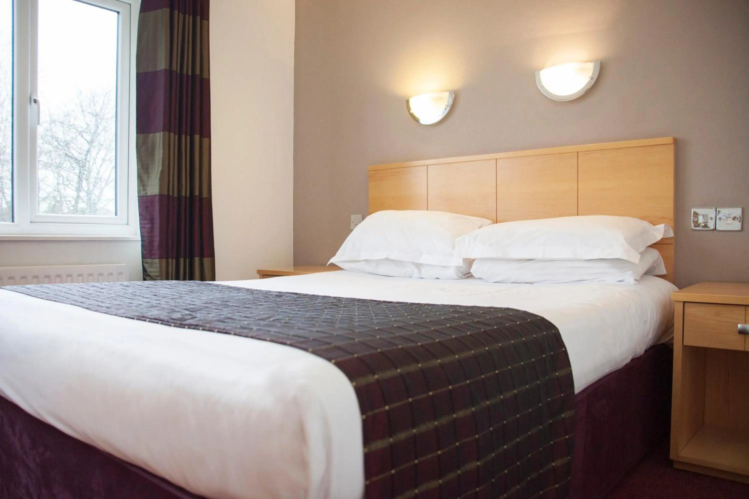 Bedroom in The Victoria Hotel Manchester by Compass Hospitality